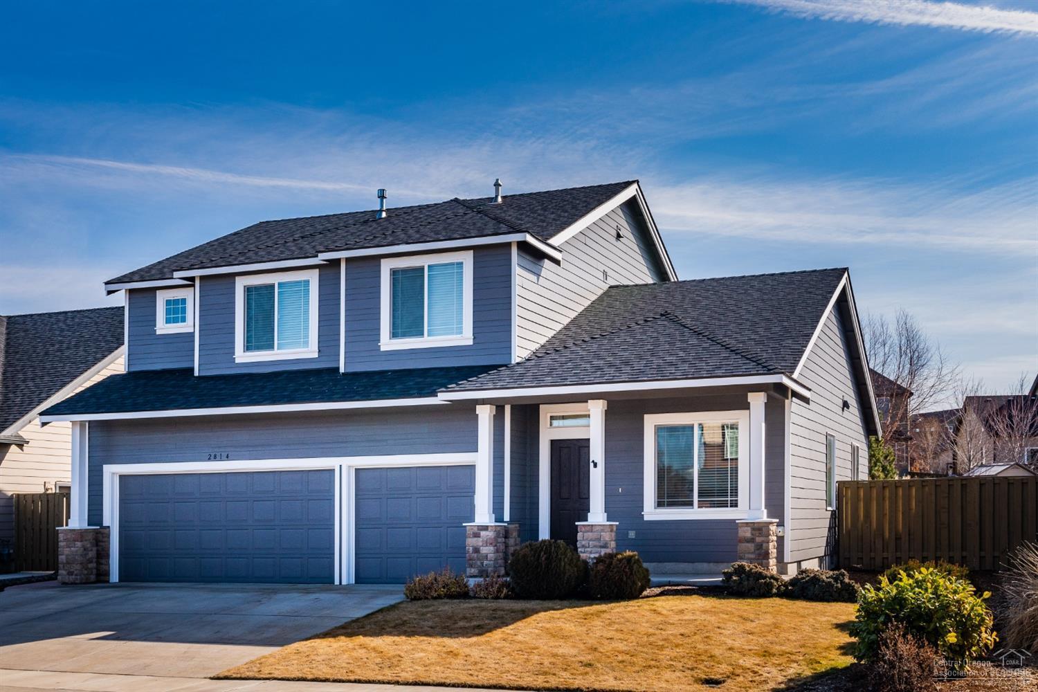 Beautiful like new home in the desirable neighborhood of Summit Crest in SW Redmond. This popular floor plan features 3 bedrooms, 2 full baths upstairs with an added bonus room, with an additional bedroom and full bath on the main floor add to the versatility of the home. Open great room layout features engineered hardwood flooring in entry & kitchen, gas fireplace in family room, as well as Stainless Steel kitchen appl, tile counters & breakfast nook. This house offers tons of opportunity for entertaining with the multiple oversized living spaces downstairs, paired with the expansive fenced & landscaped .21 acre property, an an oversized triple car garage. Upgrades include new exterior paint, newer carpet, A/C, nest home system and new dog run. Located off Helmholtz, with easy access to Bend, Redmond, the airport and close proximity to schools & eateries. The neighborhood of Summit Crest offers a beautiful park, covered picnic area, basketball courts & gorgeous Cascade Mtn Views.