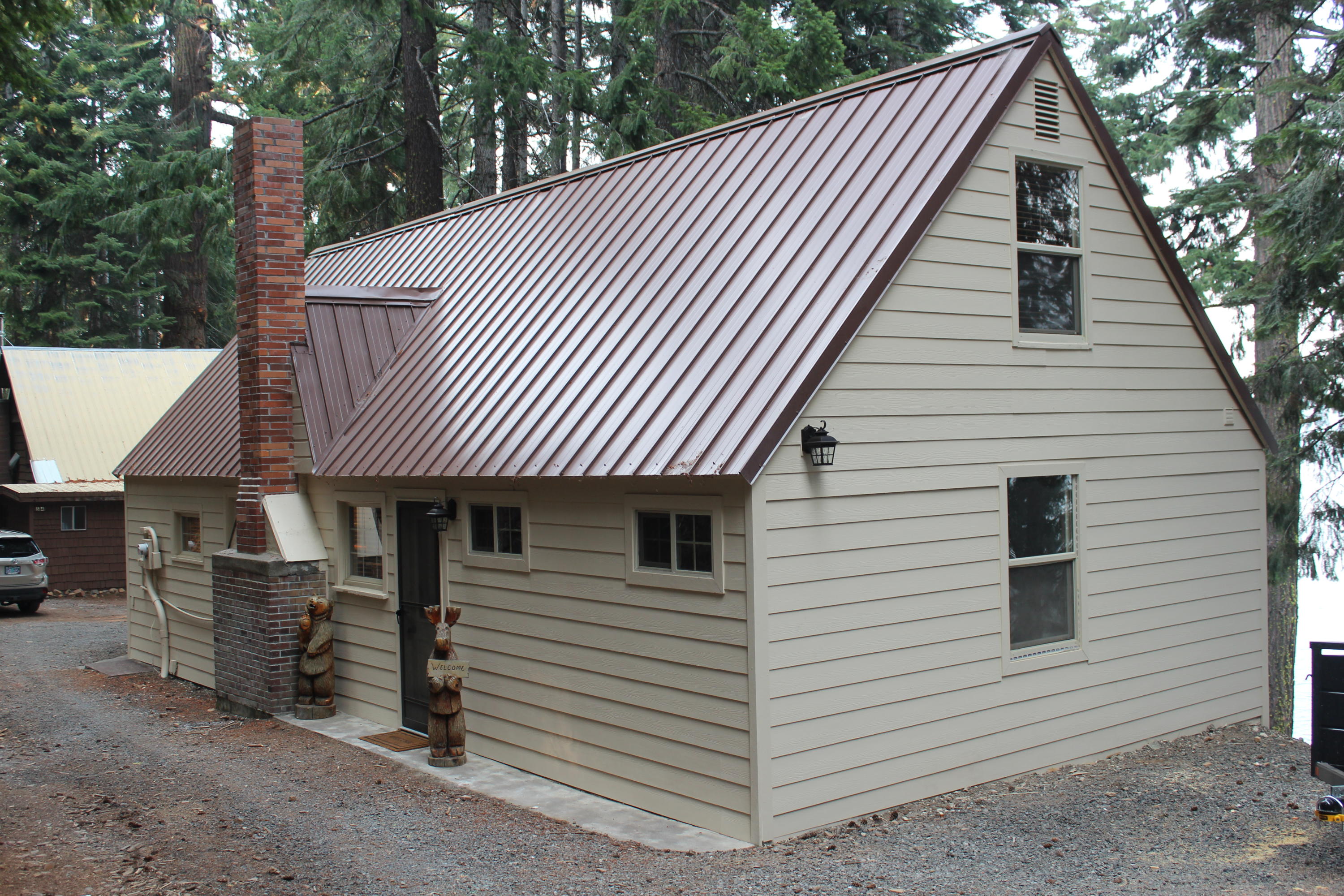 Rare West side Lake Front with spectacular lake views.  Partially finished boat house - Separate laundry building - Subject to lease currently in effect with the U.S. Forest Service