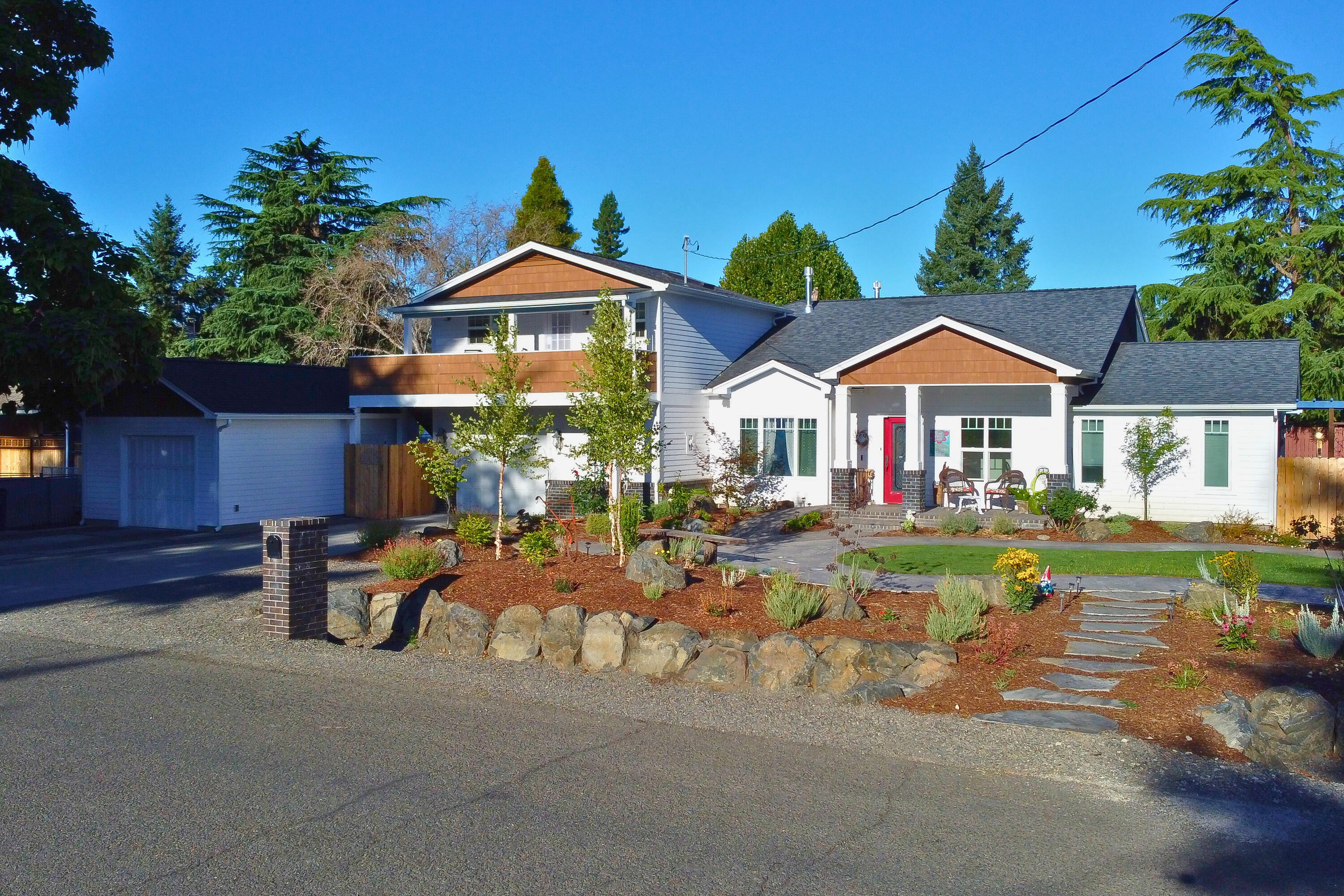 Property back on market due to buyers contingent property terminating. Celebrate the season in this refreshed corner-lot home in Southwest Medford. Newly updated with fresh interior paint, it features a striking double-sided fireplace warming both the formal dining and family rooms—perfect for cozy holiday gatherings. The gourmet kitchen offers a wraparound bar, quality finishes, and plenty of space for entertaining. Two generous primary suites—one on each level—provide ideal flexibility for guests, multigenerational living, or a private retreat.
Outside, enjoy year-round relaxation with a brand-new heated swimming pool, hot spa, gazebo, and fully fenced, beautifully landscaped grounds with stamped concrete. Whether hosting festive get-togethers or savoring peaceful winter evenings, this home is designed for comfort and connection.
Make this season extra special with your own staycation-style sanctuary.