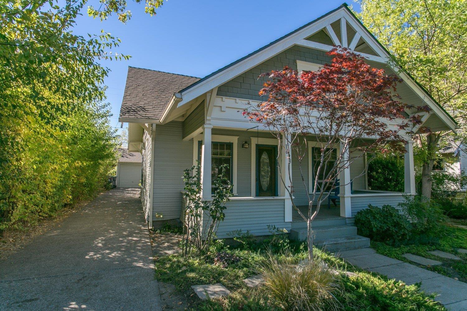 Charming Craftsman style home with original wood floors, moldings and built-ins. Nice kitchen with ceramic top range and built-in microwave oven. The living room and dining area convey the charm of the 1920's. The 2 bedrooms, 1 bath, utility room and workshop area complete the picture of this attractive home. New roof, electrical, plumbing, kitchen and bath remodel, gas heater stove and tankless hot water heater in 2004. Single car detached garage and workshop area. Fenced and landscaped with automatic sprinkler system. Private patio and back yard. Discover this special property today!