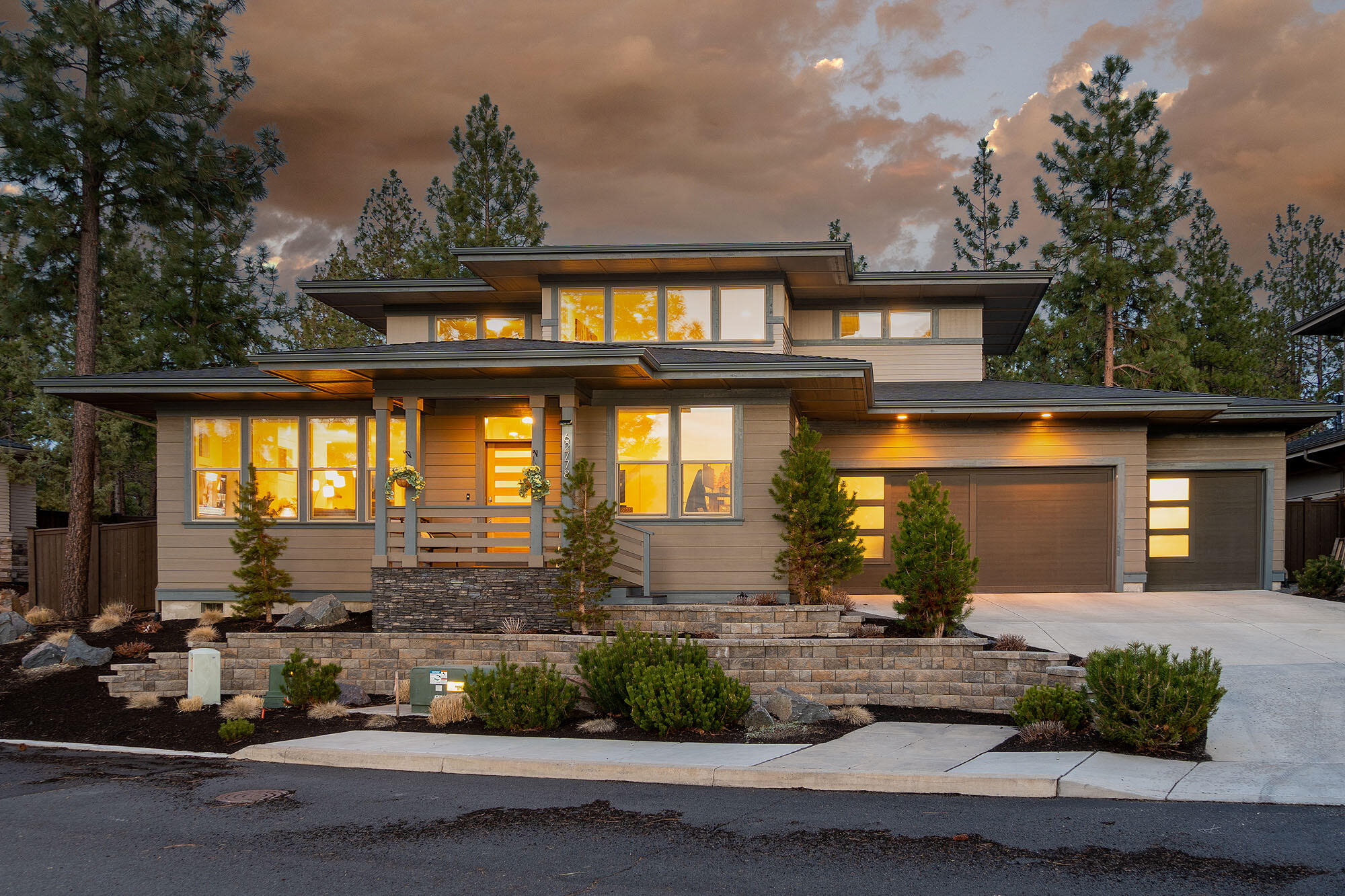 Welcome home to this beautifully designed and impeccably maintained prairie-style home built by Greg Welch in Bend's desirable Shevlin Pines neighborhood. Spacious and private .18-acre homesite is sited to capture the sweeping Cascade Mountain views. This thoughtfully appointed residence offers 2,725 square feet of living space with 3-bedrooms, including 2-primary suites, 3.5-baths, a den, bonus room, laundry room, and mudroom. Open integration of the kitchen, dining, and living areas are perfect for entertaining. Generous windows bring the outside in and create a warm and welcoming place for family and friends to gather. Quality craftsmanship and gorgeous architectural features and design elements throughout. Enjoy blue skies and warm summer breezes from the low-maintenance outdoor spaces including a covered patio, BBQ area, hardscaped patio, and swim spa. An oversized 3-car garage with a workshop area is ideal for storing all your outdoor gear. Create a legacy for your family!