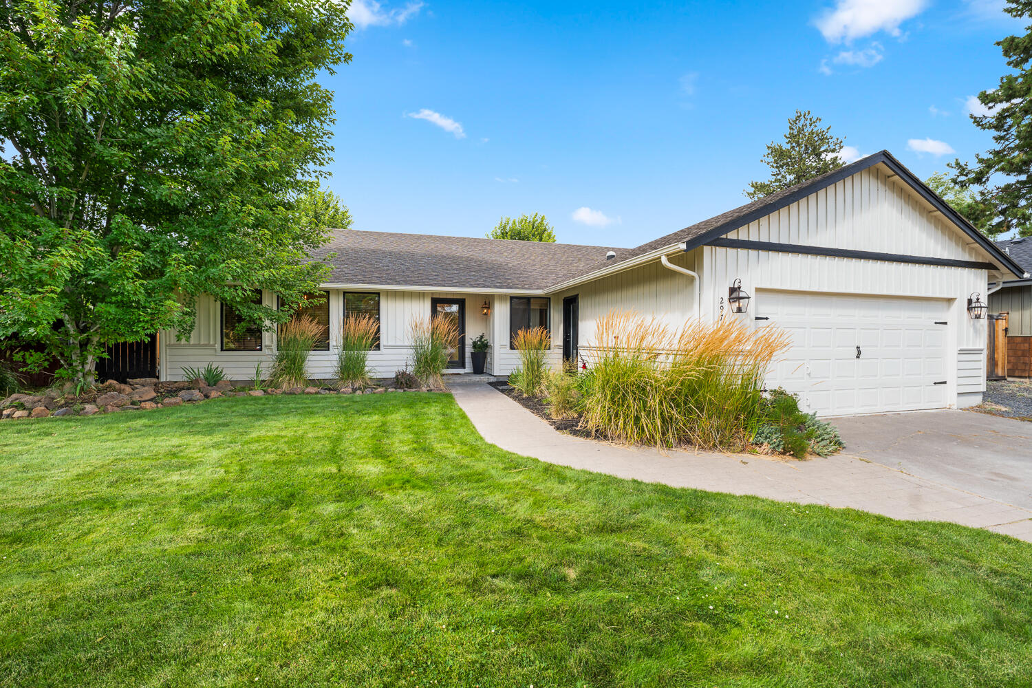 Discover why this highly coveted neighborhood is one of Bend's favorites. Enjoy easy access to Shevlin Park's scenic hiking and biking trails along Tumalo Creek, plus the vibrant parks, restaurants, and year-round events of Northwest Crossing. You're just minutes from Mt. Bachelor, the Cascade Lakes, and only 3 miles from downtown Bend! Inside, this spacious 4-bedroom home features an open floor plan, abundant natural light, and a cozy gas fireplace perfect for relaxing after a day of adventure. The garage has been converted to a versatile 5th bedroom, ideal for guests, a home office, or hobby space.