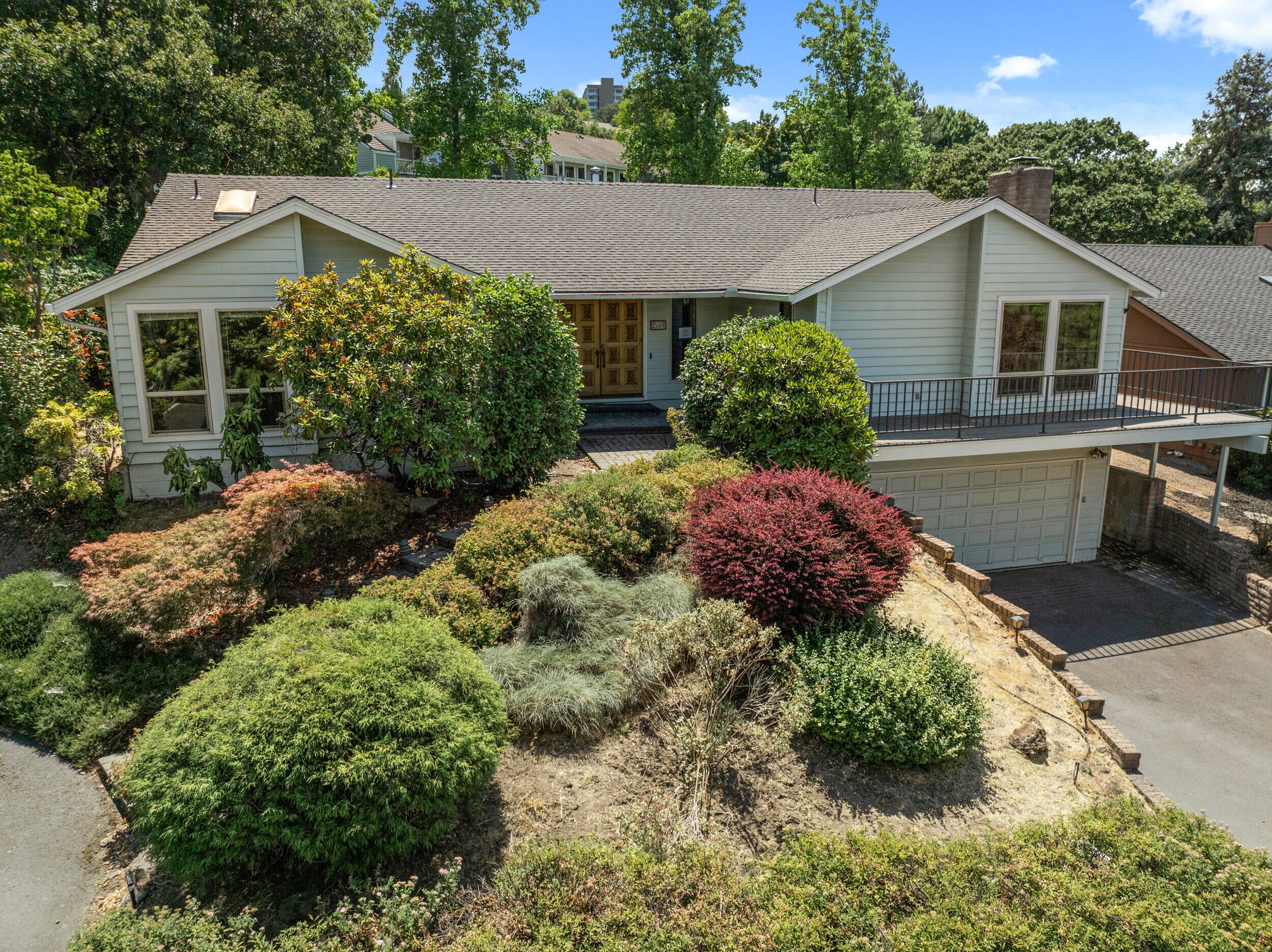 Great opportunity in desirable Sun Oaks Estates! This beautiful 3-bedroom, 2.5-bath home offers a spacious layout with a large basement featuring a half bath and laundry area—ideal for tons of extra storage and work space or a home gym.   There is already a stair elevator  installed!! The main level includes a generous primary suite with a tiled walk-in shower and double vanity. Enjoy stunning views from the upper-level front deck, a welcoming double-door entry, a roomy pantry, and a nicely sized backyard with a covered patio perfect for outdoor living. Additional highlights include an attached two-car garage and access to the wonderful Sun Oaks community amenities, including two sparkling swimming pools, a clubhouse, and tennis/ pickleball courts.