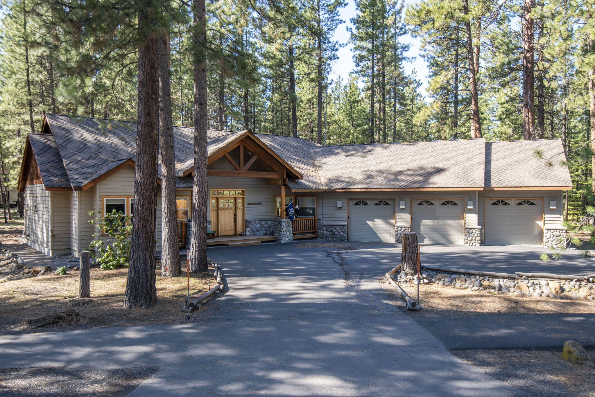 **Seller to pay for 2 points towards buyers' interest rate!!**

Beautiful Black Butte Ranch home with only 2 owners is a must see!!
River rock & lodge pine accents set this 1 level, 4 bedroom, 3 car garage home apart from the rest. 3 of the bedrooms have in suite full bathrooms. There is a half bath in the hallway. The 4th bedroom can be used as an office space. Open floor plan for entertaining and spending time with loved ones. Vaulted ceilings in the living room with a propane fireplace. Partially covered patio with hot tub access from the primary suite. Unique granite counter tops and back splash through out the kitchen/island. Wonderful Hickory wood floors. Attention was in the details when designing this home. A perfect place to call home, or a great investment property. Call us now to schedule a showing!