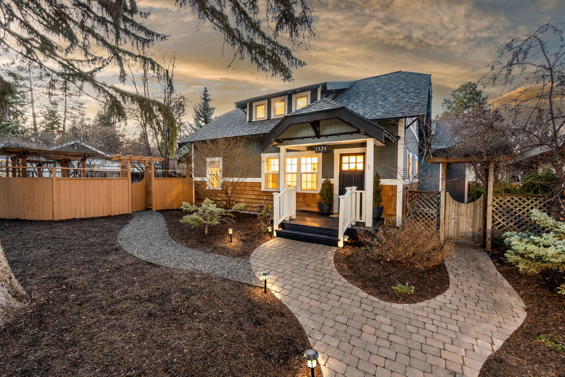 Live the good life in the heart of all things Bend. Walk or ride to coffee, dining, and shopping. Float the Deschutes, be on the trails, or on your cycle route in minutes! Mt. Bachelor is a mere 25 minutes away! The Galveston District is the ideal backdrop for this gorgeous, fully remodeled home on an uncommon .17-acre lot. Main home is 3 bedrooms, including a spa like primary suite on main, 2.5 baths, spacious living and dining area, laundry room, and loft space. Built-ins and storage throughout. Stunning design seamlessly blends charm and Northwest contemporary style. The dream kitchen offers quartz counters, s/s appliances, abundant cabinetry, pantry, and breakfast bar. Filled with natural light, the ADU offers 1 bedroom and 1 bath, kitchen, living room, washer/dryer, and its own access and dedicated parking. Unfinished basement. Storage shed. Finished two car garage with EV charger. Large, fully fenced yard. Celebrate the Central Oregon lifestyle in a big way, welcome home!