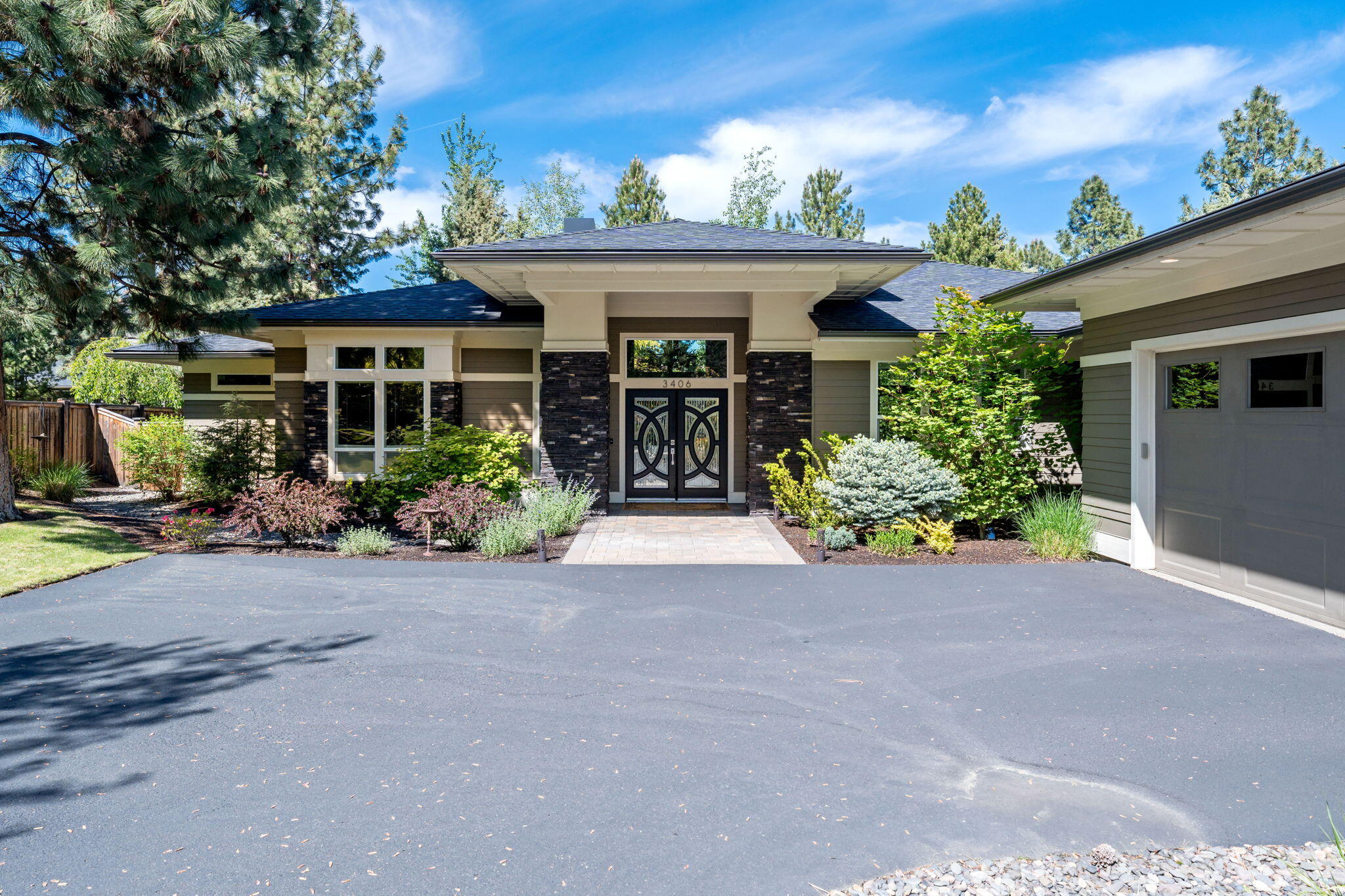 This meticulously maintained custom single-level home sits on a flat .24 ac lot in sought-after Awbrey Park. The 2,297 sf of thoughtfully designed living space has 3 spacious bedrooms, 2.5 baths, an office and a laundry/mud area  - all that maximize separation and functionality. Upon entering, the great room commands your attention with a stunning floor-to-ceiling tiled fireplace flanked by built-ins, 14 ft boxed beam ceiling, and windows with a view of the private back yard. Enjoy morning sun and a cozy fireplace from the primary bedroom and heated floors in the spa-like en-suite bath. The gourmet kitchen features custom cabinetry, an expansive island, quartz countertops, coffee bar, and stainless appliances. The fully-fenced yard boasts a garden shed and a covered back patio allowing year-round use. Epoxy covered garage floors, AC and located just 0.2 miles from the Deschutes river trail and Sawyer Uplands park. Furniture negotiable for turn-key opportunity. Come live the Bend life!