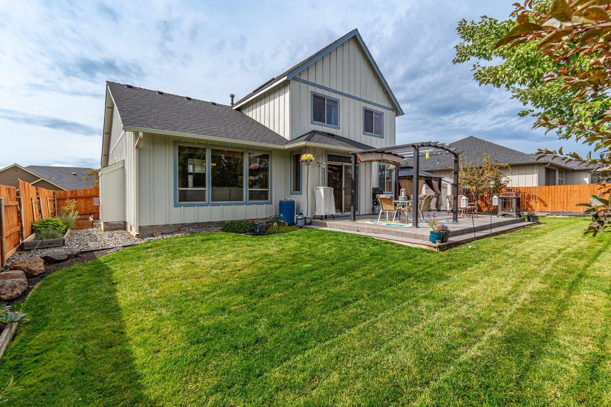Beautiful newly painted 4-Bedroom, 2.5 bath home located in the desirable NW Canyon Neighborhood. Walking distance to Dry Canyon Access, schools, and parks. Open concept  complete with gourmet kitchen, large island, pantry, stainless-steel appliances and dining area. Great room with a gas fireplace perfect for entertaining family and guests.  A bedroom/office with French doors, 1/2 bath, and laundry room complete the downstairs.
Upstairs the primary suite boasts cathedral ceilings, ensuite bathroom, walk-in closet, new flooring, and step-in shower along with spectacular mountain views.  A large hall skylight, 2 large bedrooms and a full bath with skylight finish off the upstairs.
Outside you'll find a fully fenced backyard oasis perfect for outdoor entertaining! Large concrete stamped patio, hot-tub, pergola, Koi Pond, fruit trees, sprinkler system and raised beds. RV/Boat cover complete with it's own gate. 3 car garage.
MOTIVATED sellers offing $10,000 towards closing costs.