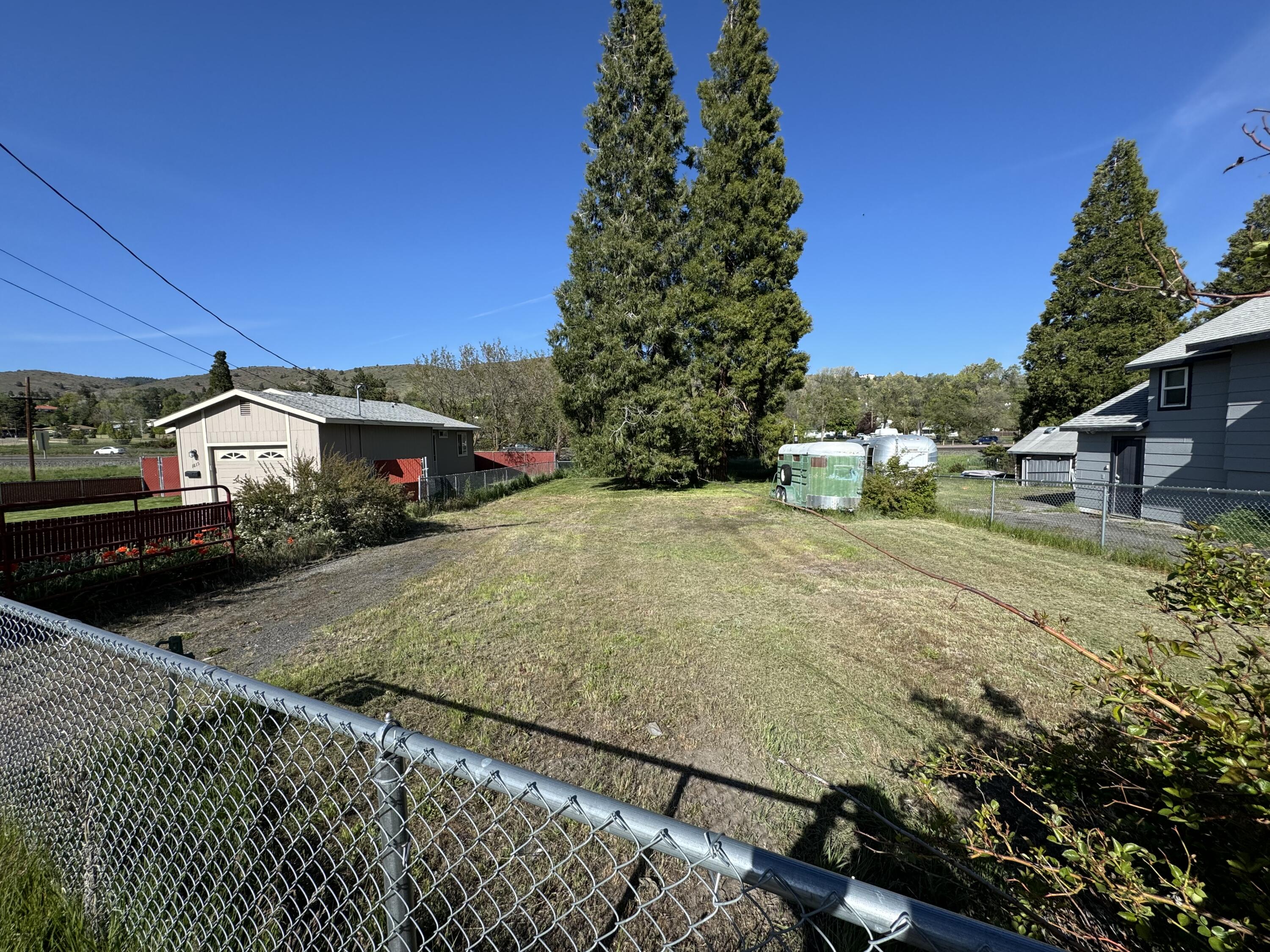 Large buildable lot in the Hot Springs Subdivision. Clean Slate ready to build your home or investment property. Manufactured homes allowed. Prime location close to Skylakes Medical Center and Oregon Tech. Very desirable area. Has active water and sewer on the property with a water hose hydrant roughly $13g in cost savings to the city when building. Fully fenced. Nice mature trees provide relaxing shade. Seller is a licensed Oregon Principal Broker/Appraiser
