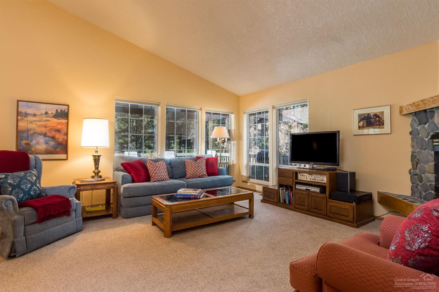 This original owner of 20 years is ready to pass their Sunriver second home to the next family to start making memories! This single level home features 4 bedrooms, including 2 suites, 3 bathrooms and a nice separation of space. Vaulted great room with gas fireplace and lots of windows for natural lighting. Abundance of storage, nice sized garage for all your extra toys. Oversized wrap around deck area for hosting a crowd. Soak in the hot tub after a fun day of activities in Central Oregon. Conveniently located off the North Cottonwood Rd entrance to Sunriver. Ollalie Lane borders the National Forest. Partially furnished, SHARC assessment paid in full!
