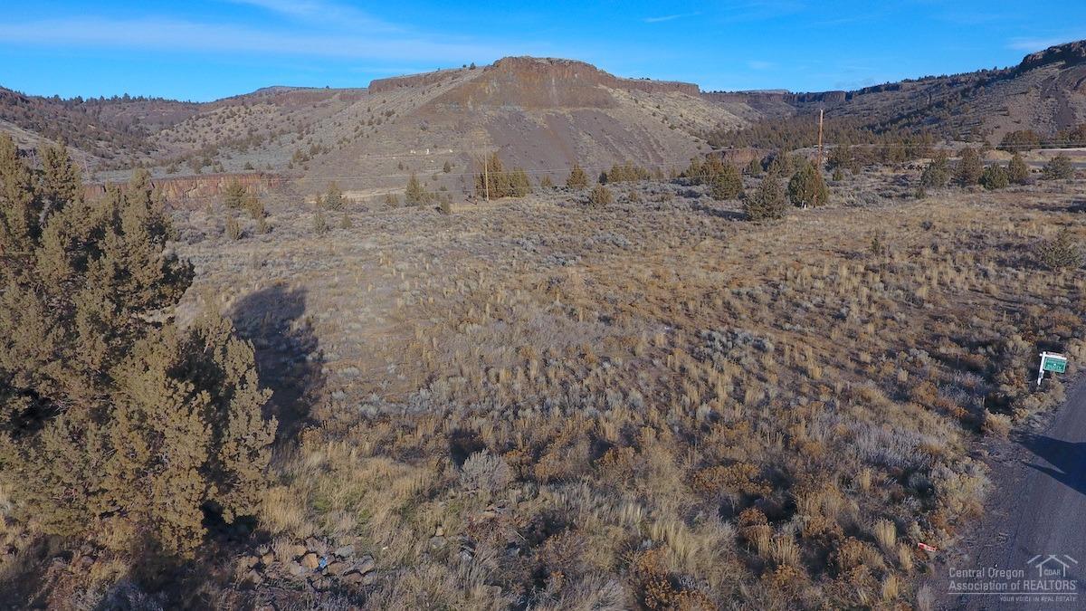 Now is your chance to join the expanding Crooked River Ranch amenities! Bring your business savvy to this 1 acre parcel with gorgeous views of the surrounding canyon.  Build your business or simply invest in this growing commercial community.  Power and water are both at the street, needs septic feasibility.  there aren't many commercial lots left in this lovely area so don't miss this opportunity!