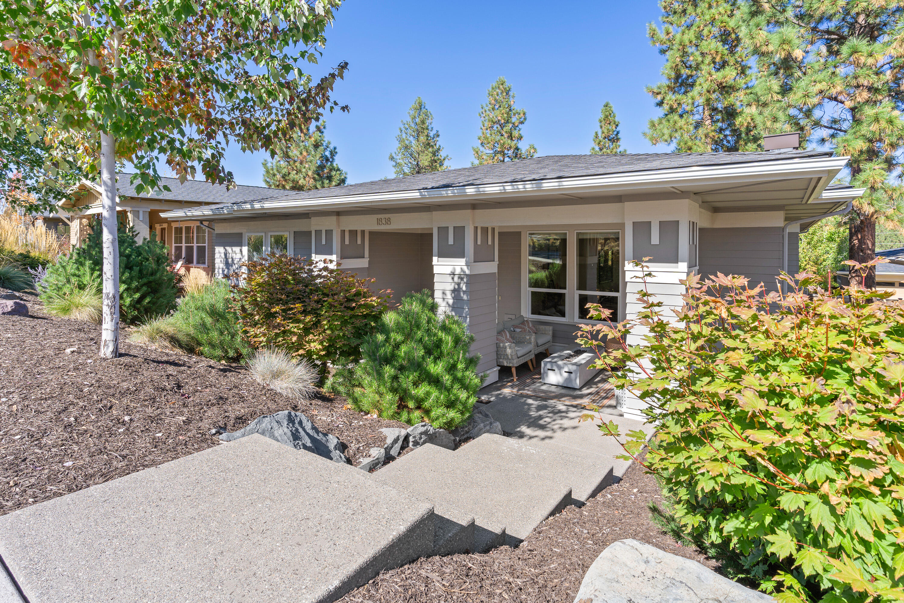 Single level, light and bright Frank Lloyd Wright inspired home in the award-winning Northwest Crossing. This home was built by Cloninger Custom Homes and no detail was  overlooked. Custom cabinetry and quartz solid surface counters throughout. Nice separation of bedrooms for privacy and a spacious front porch and back deck to take in the Central Oregon beauty. A short distance to the Galveston business corridor and just a  stroll to all the amenities that the heart of NWX has to offer. Oversized garage with 10'x18' garage door will accommodate most Mercedes Sprinter (or similar) vans. Call to set up your showing today!