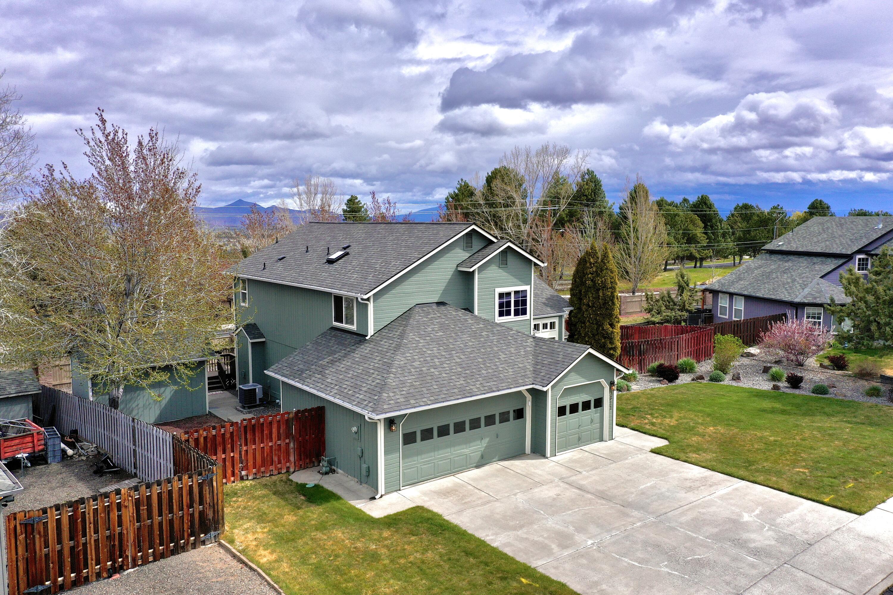 Welcome home! Located in the highly sought-after community of Cascade View Estates sits 3811 SW Volcano Ave. This home boasts 1,992. sq. ft. of living space, 4 Bedrooms 3 full baths and a spacious fenced-in yard with a very well designed functional floor plan. This home has many upgrades including: newer paint inside and out 2021 & a new 30 year roof. There is a fully finished detached studio that would make a great man cave/she shed. Nearby you have parks , tennis/pickle ball courts. Minutes from Redmond schools, essential shopping and dining and easy access to the 97 and 126 freeways. Seller is offering a buy down credit to buyers! Call today!!