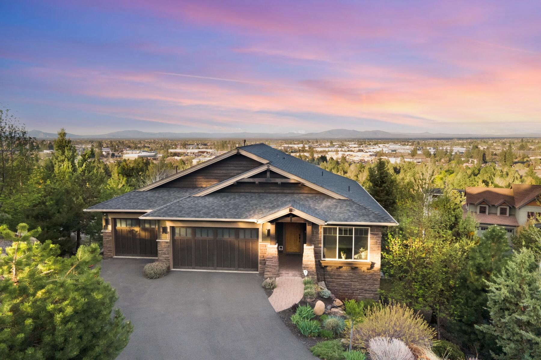 Stunning easterly views, ample and immaculately maintained space to relax into! The main level features a great room with stunning light and an expansive view, chef's kitchen, office, full bath, a beautiful primary suite and a spacious 3-car garage. The lower level has a large living area, kitchenette, secondary laundry, media room/office, two bedrooms en suite and a secret hideaway.
This home has potential for multigenerational living, idyllic home office(s) or an incredible family setup. As a smart home, it has extensive security and automation from a phone in the palm of your hand. Special features include built-in tech, custom California closets, whole-house water distiller, central vacuum on each level and in the garage, and so much more!
Both levels have complete outdoor living on the decks, including an outdoor TV. The invitation to experience abundance and warmth is alive in this home. ***GPS is incorrect - Take Mt Washington to Fairway Heights Dr to the end and turn right.