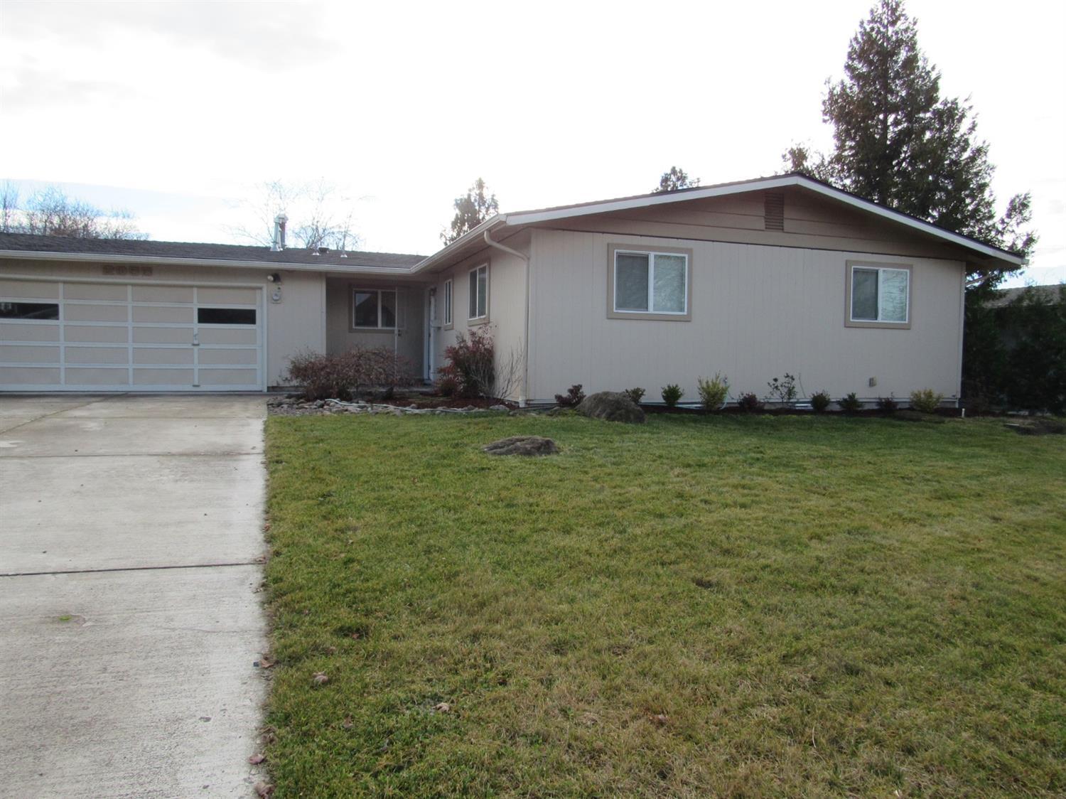 Location is huge! Hoover Elementary, near Asante Medical, SE Medford. This well cared for home is simple, affordable and has key updates which include new roof and new vinyl windows throughout. There are original oak floors through most of the home along with gas heat and gas water heater. The family room is a lovely addition and adds a wonderful room for family gatherings. The living room is bright and airy and features a beautiful brick fireplace. Out back is a very large, fenced backyard with sprinkler system. There is room for RV parking out front.