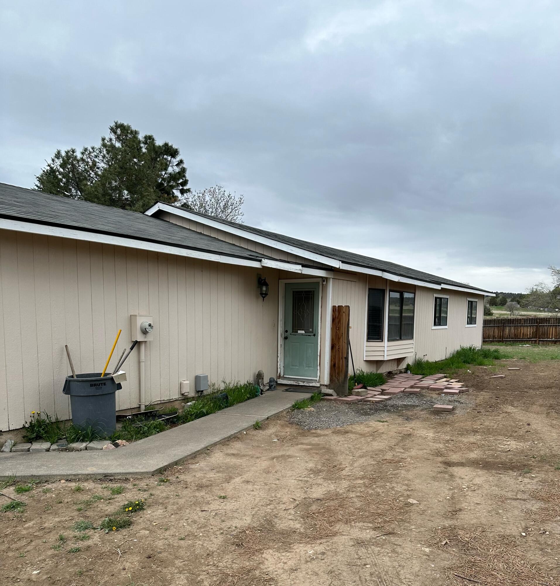 Great starter home. This 3 bedroom, 2 bath sits on a large city lot with lots of outdoor space. The open concept living space with vaulted ceilings is perfect for entertaining. Call your favorite local realtor to see this new listing, its ready to make it your own.