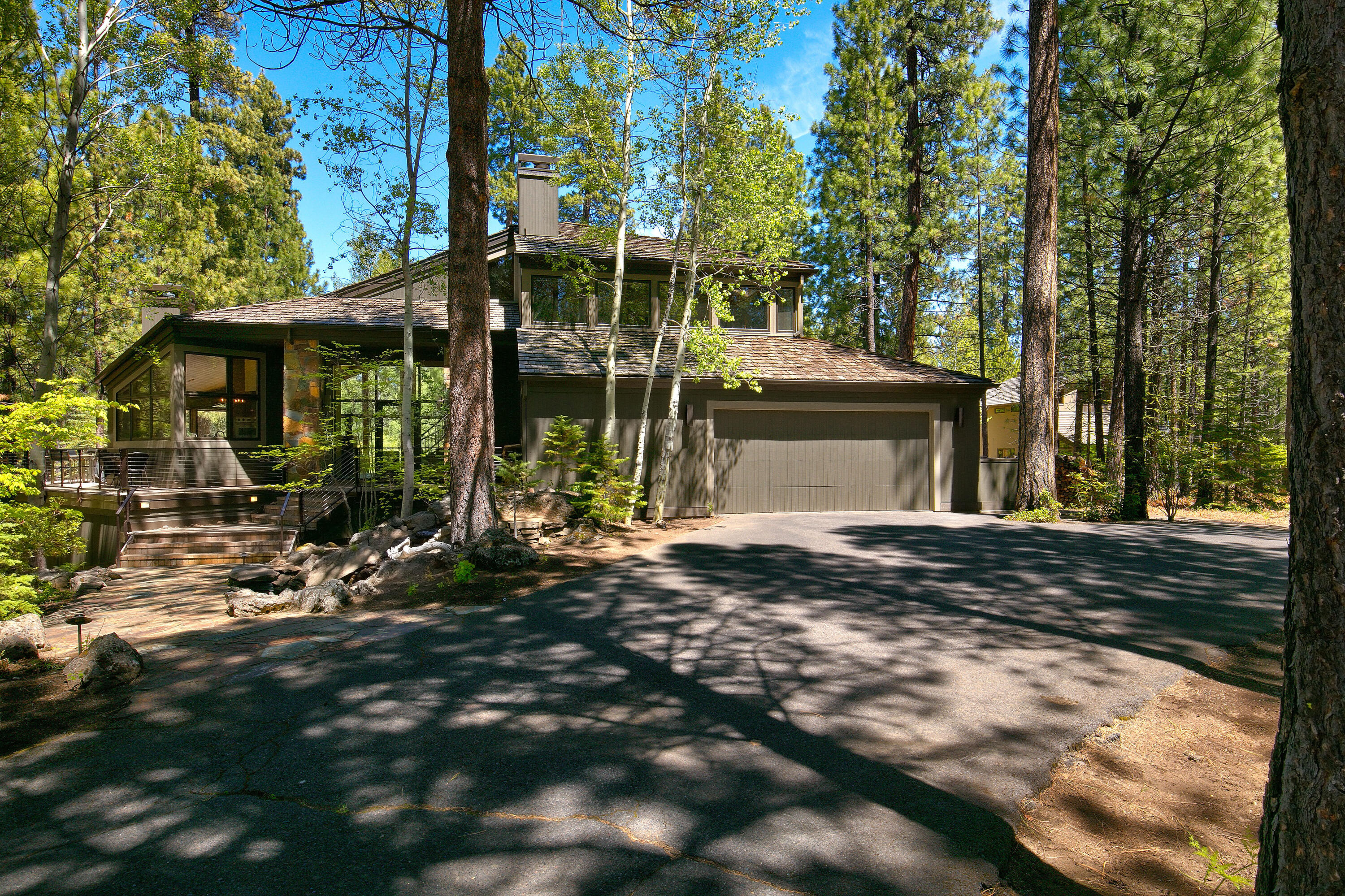 Designed by Steve Van Sant, this incredible property offers luxury at its finest in Black Butte Ranch. The home features 4 bedrooms and 5 baths with an incredible master suite, plus room for the entire family. When you enter through the front door, be greeted by incredible views of the 12th fairway with floor to ceiling windows in the vaulted great room. The remodeled kitchen is fit for a
chef. Outside of the home, be stunned by incredible water features, plenty of outdoor living space, and more. No detail was spared in the build of this exquisite property and it's a must see to truly appreciate.