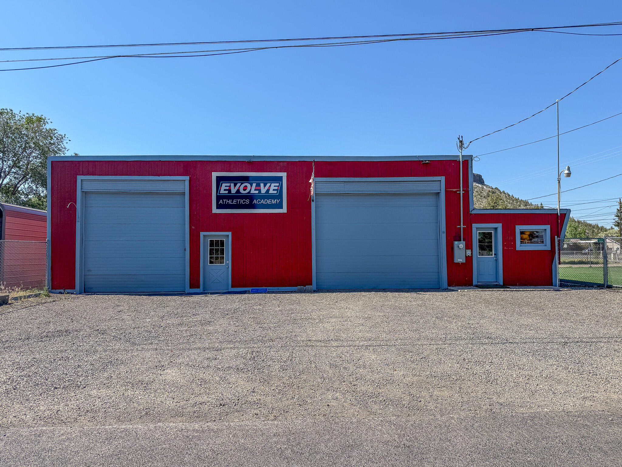High-visibility commercial building for sale in Prineville, Oregon. This standalone commercial property offers an excellent owner-user or small investor opportunity in a growing Central Oregon market. Located along SE Melrose Drive, the building benefits from strong daily traffic exposure—ideal for service-based businesses, trades, office-plus-storage users, or retail/service operations seeking visibility and accessibility. The property provides functional interior space with flexibility for customization, on-site parking, and straightforward access for customers and deliveries. With limited inventory of commercial buildings in this price range, this is a rare chance to own rather than lease and establish a long-term business presence in Prineville. Positioned for immediate use, this property presents a solid opportunity for businesses looking to expand or investors seeking a stable commercial asset. Selling willing to rent at $2,000/month.