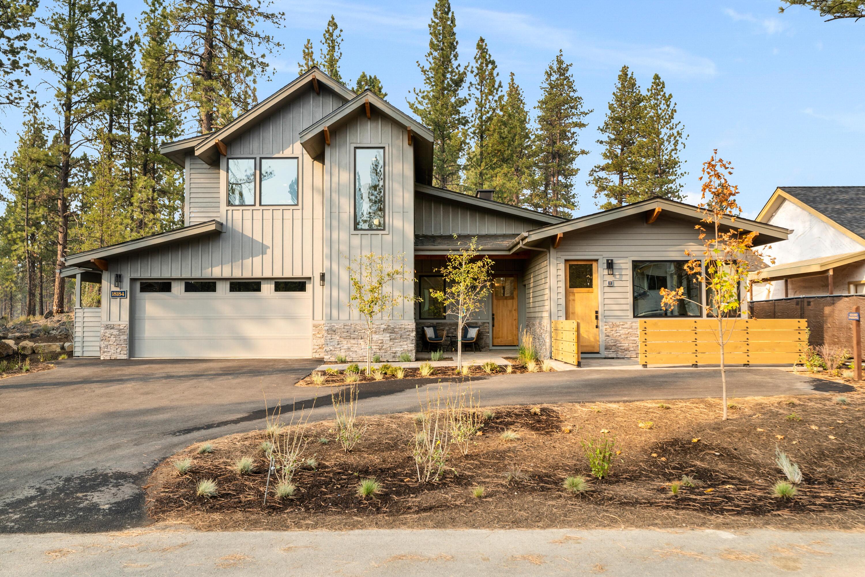 Gorgeous Forestbrook two level Aspen plan with stunning water views through floor to ceiling windows in the great room. Experience luxury mountain living in this premier vacation home offering a unique opportunity to own in the heart of Caldera Springs, just 15 minutes from Bend and 30 minutes to world-class skiing at Mt. Bachelor. Designed for those seeking the benefits of both a vacation getaway and rental income property, this modern mountain home features an attached studio residence that can be occupied with or separately from the main home. Great proximity to Caldera Springs' new Forest House with aquatic center, fitness, club house, cafe & bar, pickleball, and dog park. Owners enjoy access to all amenities at Caldera Springs, including 9-hole golf, parks, the reimagined Lake House dining, cruiser bikes, miles of new trails & lakes, kayaks, paddle boards & more. Home is under construction, taxes TBD. Photos are of a similar home.