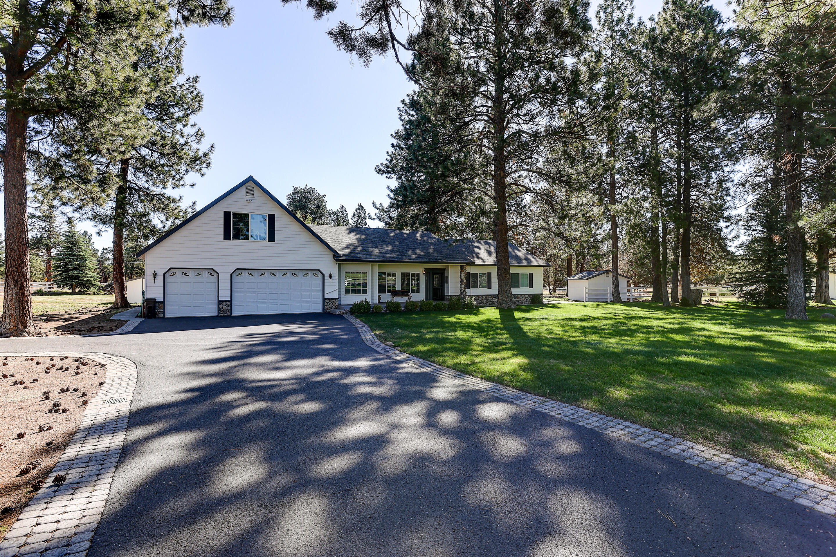 Welcome home to this beautiful 3 bed, 2.5 bath home on Cloverdale Road, located between Bend and Sisters. Unbroken, breathtaking views of the Cascades greet you as you relax on your front porch. Conveniently located 15 minutes from Bend and 10 minutes from downtown Sisters, you won't believe you are so close based on the serene environment. The primary bedroom includes a HUGE walk-in closet, while a junior suite includes an attached bathroom.The home also includes a separate dining and living room, breakfast nook, large office with custom wood shelving, a spacious laundry, as well as a bonus room above the three car garage, which includes epoxy floors and plenty of custom storage. Outside, enjoy the rest of your 2.72 acres of mature pine trees and well maintained grass areas. Relax by the gorgeous water feature often frequented by local wildlife! There is plenty of potential for a garden area, play structures, animals, etc. Schedule a private showing now - this won't last long!
