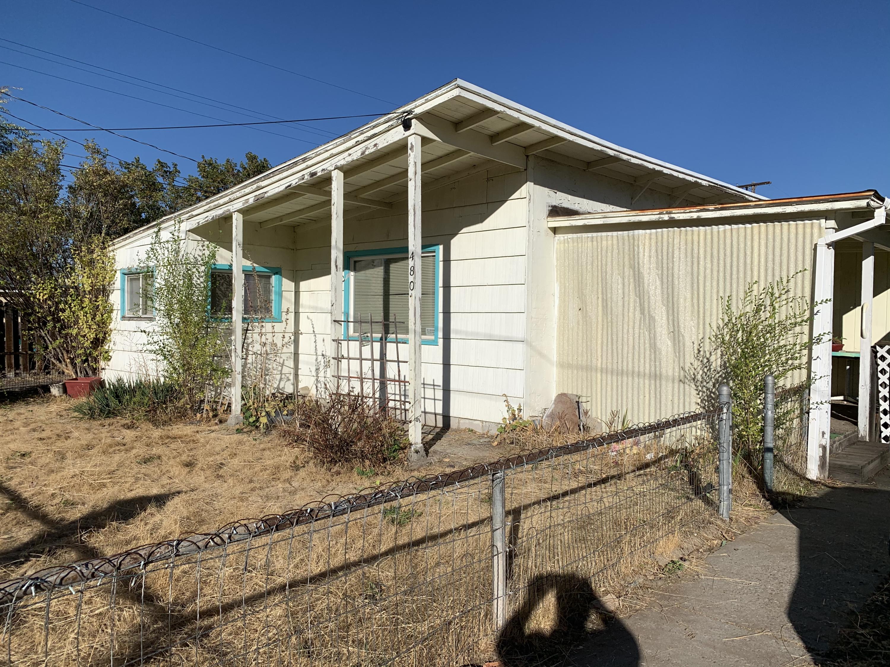 Charming cottage in the heart of Prineville. 1250 sq feet of living space ready for your finishing touch. 2 car garage with shop area. Courtyard off front porch. Home has been well loved for many years and now needs a new owner to give it some needed TLC and make it their own.