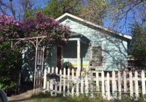 Great investment opportunity! 782 sq ft cute 2 bedroom, 1 bath cottage currently rented for $850/month AND a detached garage with a 400 sq ft. studio apartment currently rented for $695/month. Many updates/improvements last year. Contact Listing Agent to arrange showing. Requires 24 hours notice to tenants. Seller to do a 1031 Exchange. Listing Agent related to Seller.