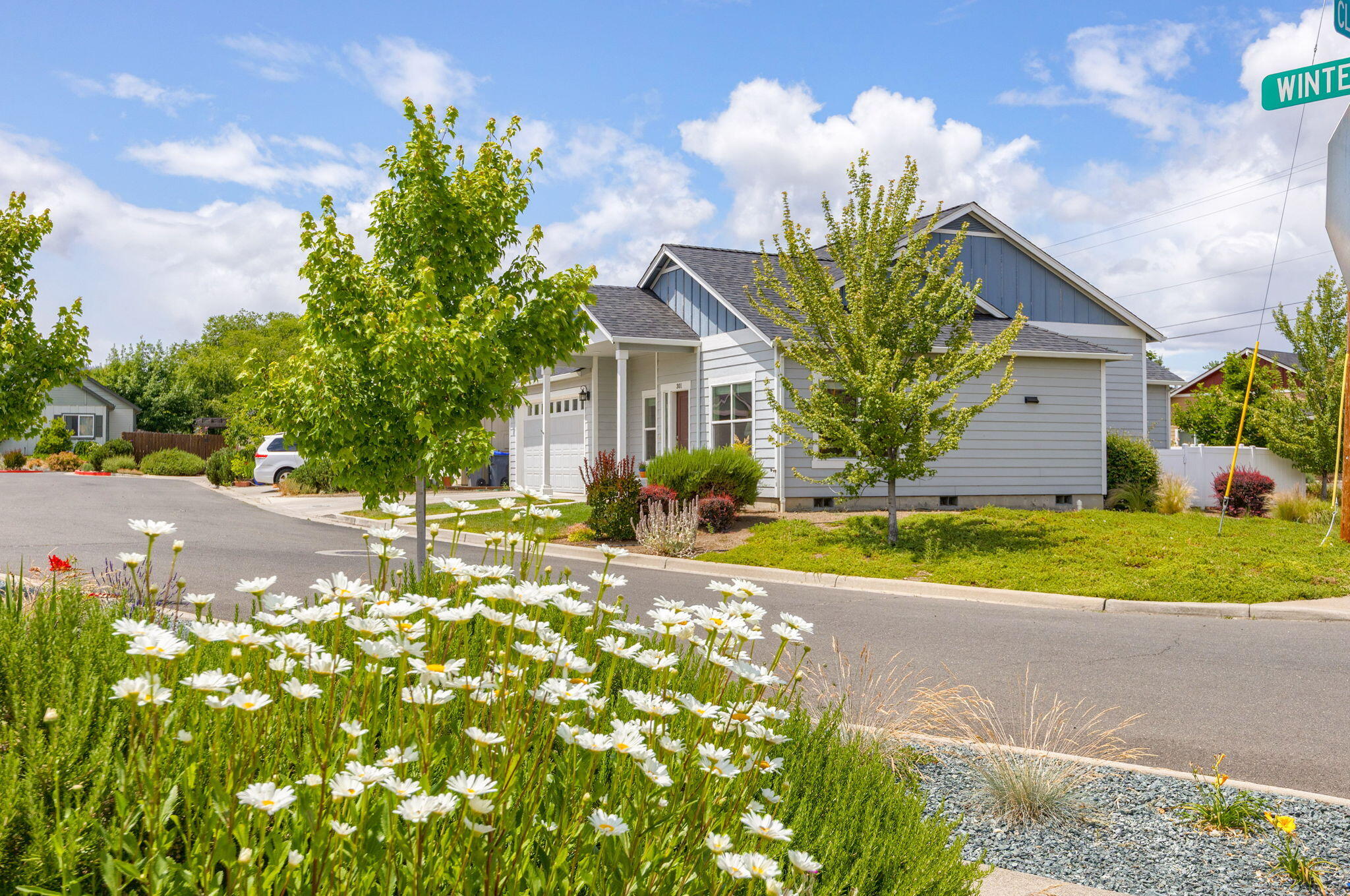 *Brand New 40-year roof has been installed.*  A well-kept, single-story home on a sunny corner lot, close to the bike path and just minutes from town. This 3-bedroom, 2-bath home offers 1,508 sq ft of comfortable living space, a 2-car garage, and the ease of single-level living—a real plus in this area. Lovingly cared for by a single owner.  The kitchen features granite countertops and stainless steel appliances. The HOA maintains irrigation, watering, and plantings in all common areas—including front yards—making outdoor upkeep simple and stress-free.  Located in the heart of Talent, you're close to great local restaurants, the Camelot Theatre, and beautiful nearby wineries. It's an easy, relaxed lifestyle in a friendly community.