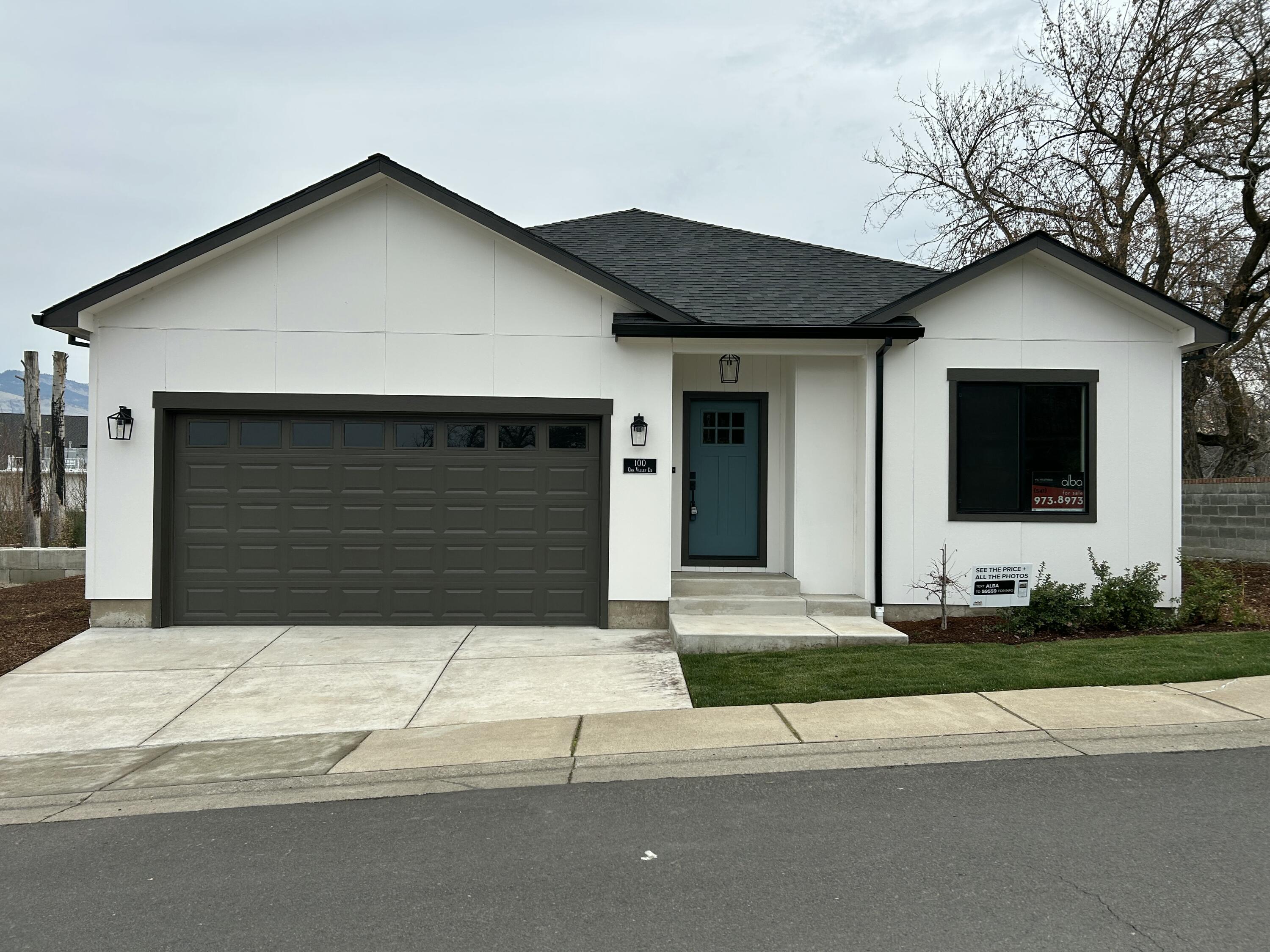This beautiful single-story 3-bed/2-bath plan by Rispoli Design & Build features 1,272 sq ft (per builder), 100% Hardie cement non-combustible siding & trim exterior, and is conveniently located in a 55+ community near pool & clubhouse. Standard features ensuring quality & longevity are upgrades elsewhere. The open floor plan features high-efficiency ductless mini-split heating & cooling system, quartz countertops, heat pump water heater, laminate flooring, full door & window trim, porcelain tile, upgraded stainless steel KitchenAid appliances, solid-wood Diamond cabinets w/soft-close doors & hidden hinges, fully finished garage with wi-fi opener, charging station, professional landscaping, fully fenced, and more! Per Energy Trust report, 30% less energy costs than standard new home. HOA dues of $185/month include garbage, landscape maintenance, clubhouse and pool. Ready for immediate occupancy.