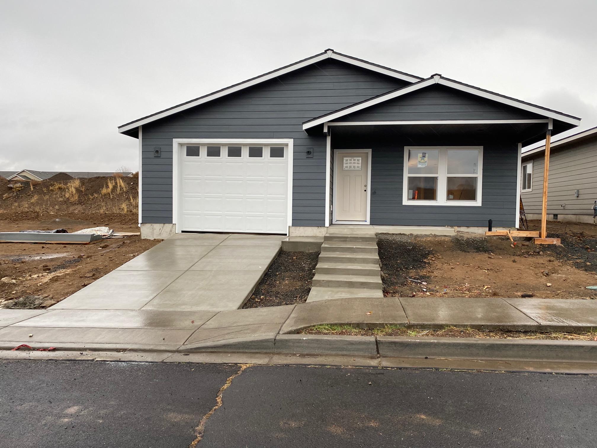 Brand new home with Custom cabinets, gas appliances, custom finishes, open floor plan.   8' walls.  Just a lot of home for the price.  Front yard sprinklers with good curb appeal.  Don't miss out.  Home to be finaled with occupancy permit by December 15, 2020