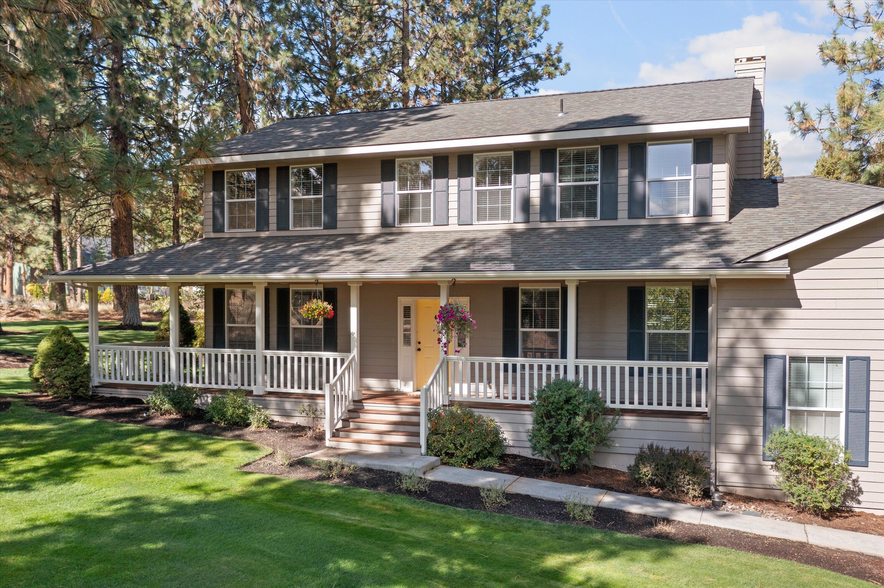 Welcome to a quintessential Awbrey Butte home situated on a sprawling manicured 1 acre lot offering a peaceful escape atop one of Bend's most coveted neighborhoods. Nestled at the end of a quiet cul-de-sac, this expanded and flexible plan boasts 4 beds upstairs including 2 primary suites, main-level living room and bonus room, and built-ins throughout that blend style and function. The updated kitchen opens to dining and living spaces reflecting the ease and comfort of how this home lives. The park-like backyard beckons with ample entertaining and living space. Relax in the private hot tub, roast marshmallows around a fire or take a nature walk on the trail accessible from your backyard. With two water heaters, furnaces, and AC units, and a newer 30-year roof, this home offers peace of mind and efficiency for years to come. The oversized 2-car garage has a storage area and the driveway ample spots for extra wheels! Experience the tranquility and space of this idyllic property.