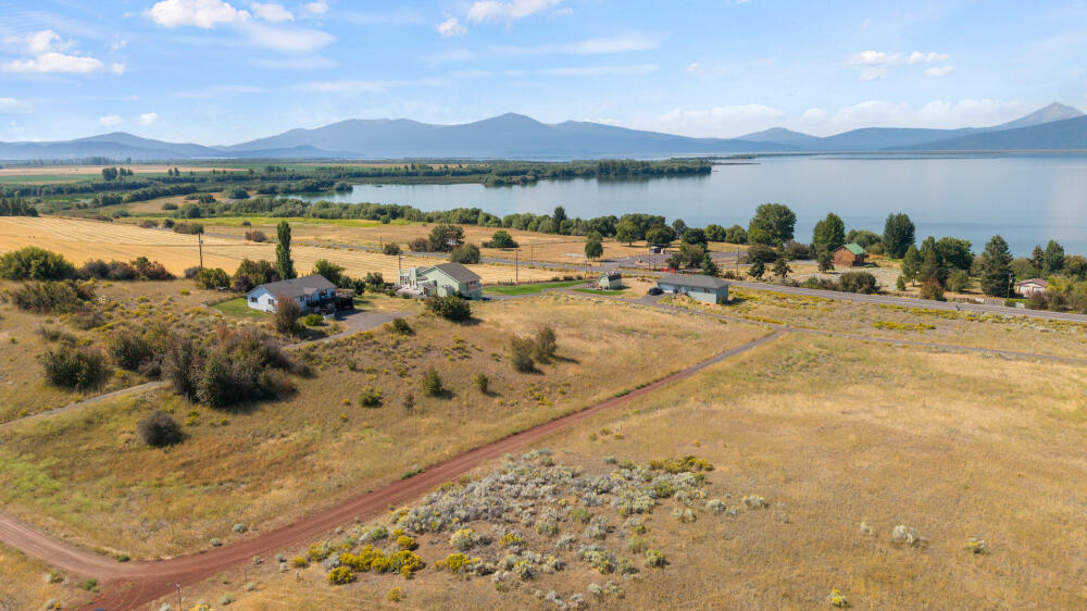 Opportunity knocks with this fantastic 0.55-acre buildable lot with in the Oregon Shores community, offering beautiful views of Agency Lake and unbeatable access to Southern Oregon recreation. Located within walking distance to the lake, this property is ideal for building a vacation rental, getaway cabin, or your dream home with investment potential. As an Oregon Shores owner, you'll have exclusive use of a 17-acre private waterfront park and campground, perfect for entertaining guests or enjoying weekends by the water. Just minutes away, you'll find world-class trout fishing on the Williamson River, the Wood River for kayaking, Kla-Mo-Ya Casino for entertainment, and the iconic Crater Lake National Park only 15 miles away. With its prime location, stunning views, and endless recreational opportunities, this lot is a smart investment in one of Oregon's most scenic destinations.