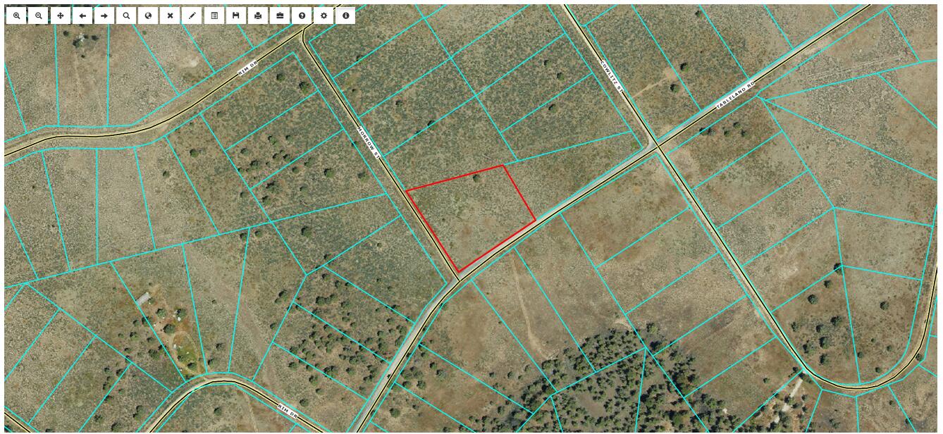 Great corner lot with 2.27 acres ready to build your dream home!