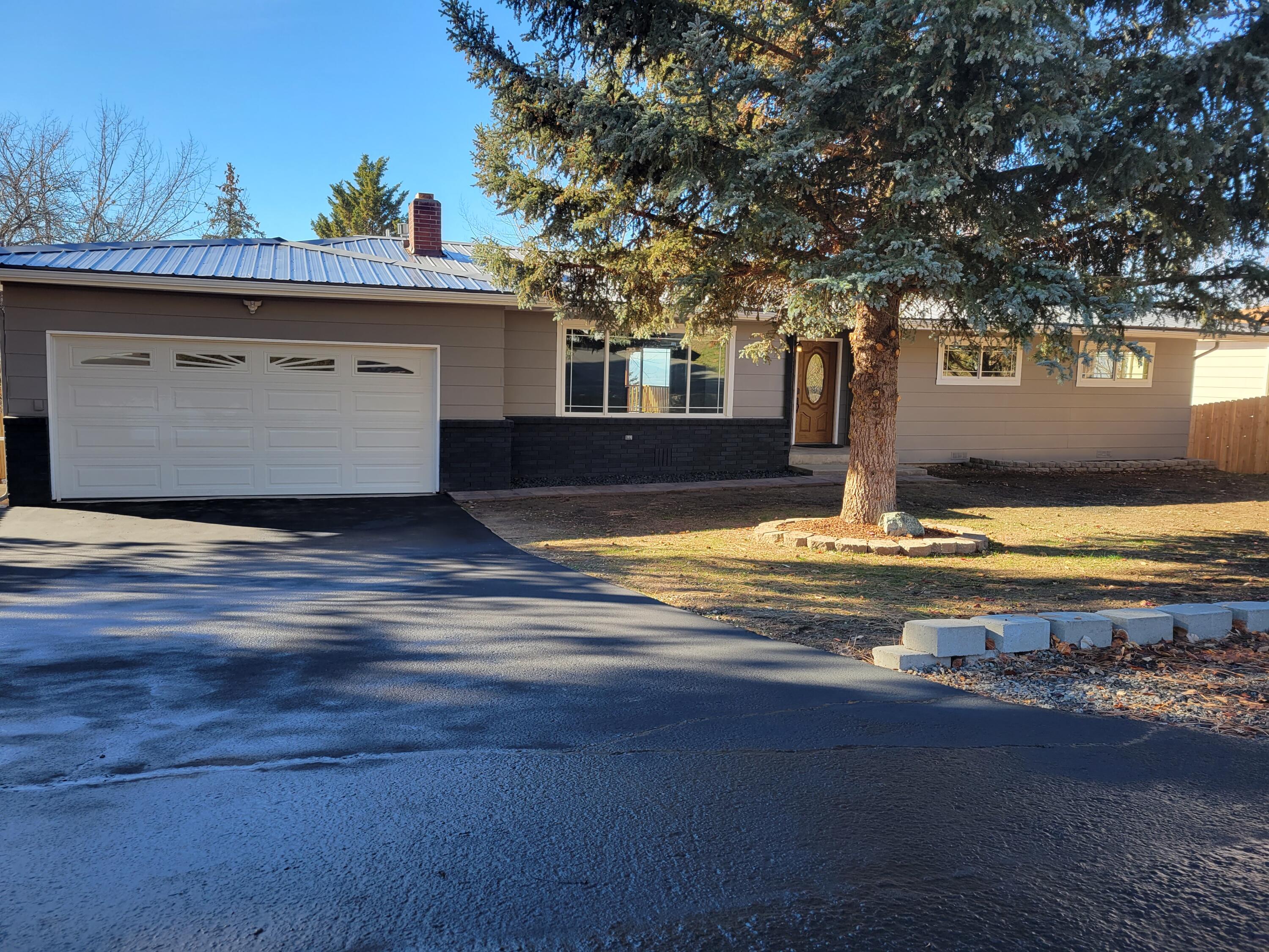 Come take a look at this beautifully remodeled Moyina Heights home. This turn key home features 1,796 sq ft of living space including 3 spacious bedrooms, 2 and a half bathrooms, a large living room with a cozy gas fireplace, a gorgeous kitchen with granite countertops, a deep stainless steel sink, top of the line appliances that are all included, a kitchen island with extra storage, a cute dining area overlooking the backyard, a large bonus room with access to the 2 car garage, a laundry room with sliding barn doors and a new stackable washer/dryer combo. The large, fully fenced and landscaped backyard is low maintenance, has a separate dog run area  and a stone fire pit to enjoy outdoor living. The home has beautiful views of the Klamath Basin from the covered back deck, views of Mt. Shasta from the master bedroom, not to mention a secure, unfinished basement area to store your extra belongings and toys. There are too many great things to list, you must see this home for yourself.