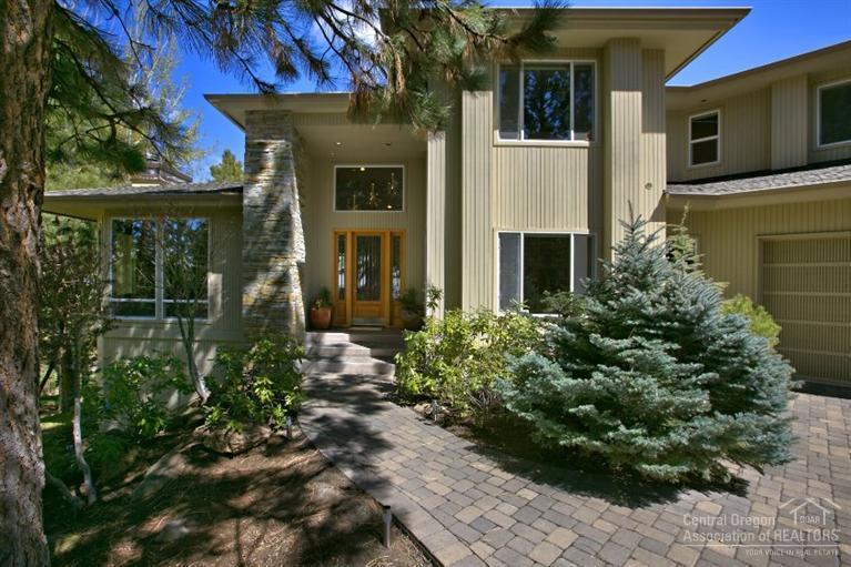 Fabulous Northwest contemporary home with mountain & terrain views on a large site offering privacy. Dramatic entry, open floor plan, both casual and formal dining areas, master suite and den/office on the main. 2 additional suites and bonus room upstairs. Owner did a $250,000+ remodel w/ Norman Bldg in 2005-CLA for details. Expanded deck with wind protection for true outdoor enjoyment/Hot tub included. Extensive stereo/entertainment system. Water feature, built in cabinets/garage. Lots of storage areas.