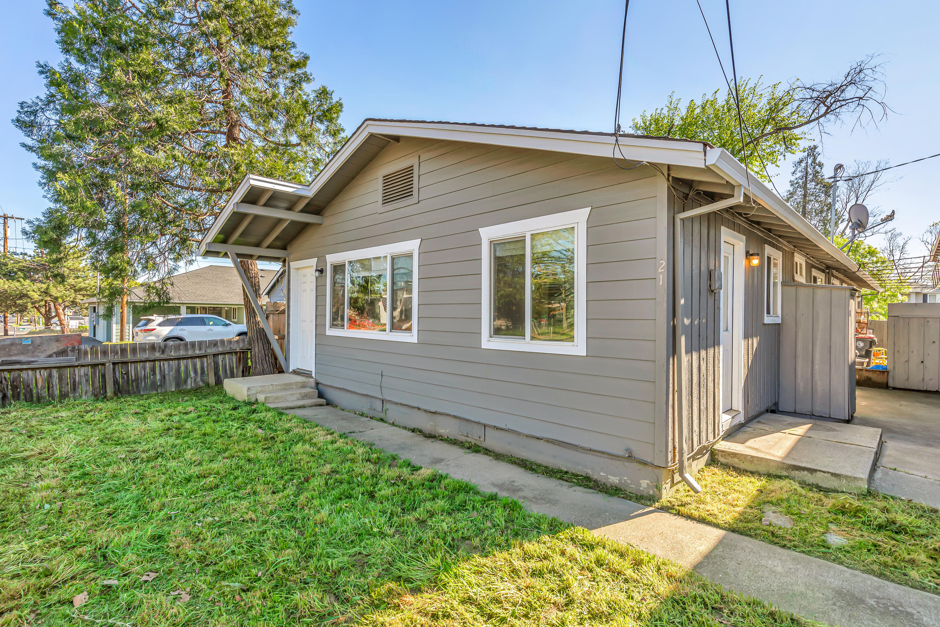 Charming West Medford duplex ideally located near amenities and transit. Each unit offers 2 bedrooms, 1 bathroom, indoor laundry, and a 1-car carport. Both units have received updates, including one with newer hardwood floors and tile. One unit features modern upgrades with granite countertops, stainless steel appliances, and laminate flooring. A great opportunity for a strong investment return or multi-generational living.