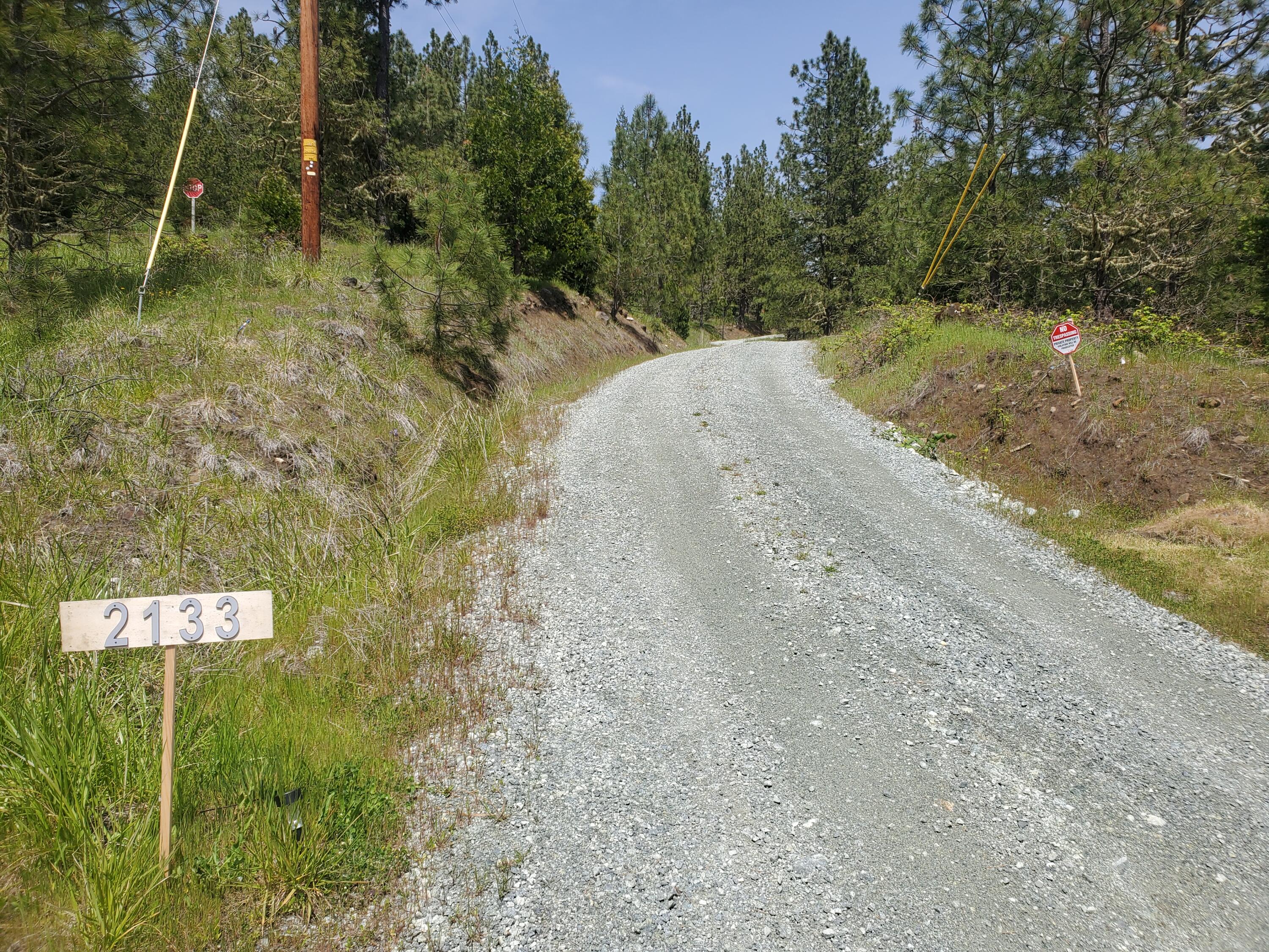 Breathtaking private mountain retreat close to town. Just minutes out of the quiet town of Myrtle Creek you will find this 20 wooded acres with incredible panoramic mountain views that backs up to 904 acres of BLM. Ready to build your dream home with 68' x 134' building pad, home site approval, well is in, cabin has solar, and power is at edge of property. 11.5' x 20' storage shed finished as living space with laminate flooring and loft area. Very private and peaceful and close to Umpqua River and I5!  Property is occupied. Do not disturb without appointment.