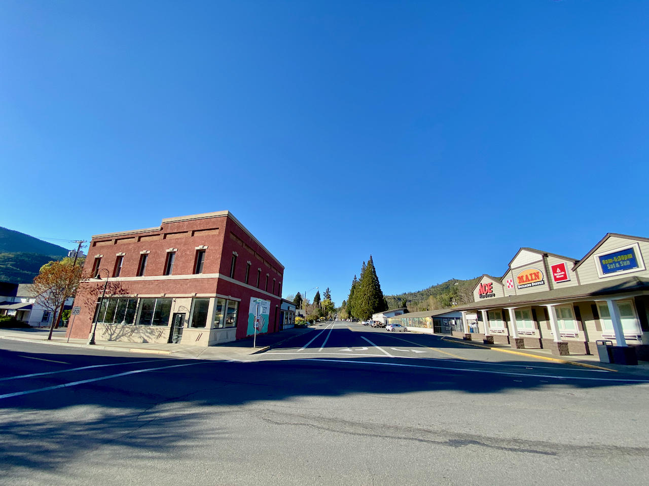 Incredible income potential in this historic icon in the heart of downtown Rogue River. Two beautifully renovated upstairs flats with 12' ceilings, large windows, and views of downtown. Ideal for rentals or to live in while you run your business down stairs and collect income from other tenants in the Old City Market building. The 2 upstairs completely remodeled residential flats are 1500+/- s/f each with new tile, cabinets, washer/dryer, windows, & AC. The main level is 3325+/- s/f retail business offices with unfinished red brick basement of 1280 s/f. with new mini split and dehumidifier ideal for wine tasting room or events. The building has been renovated with new red cherry flooring, heating system, new roof & more. 9 on-site parking spaces as well as street frontage. Furnishings included with apartments which were bringing in $300 per night as short term rentals or $1500 as long term! Interior photos coming soon.