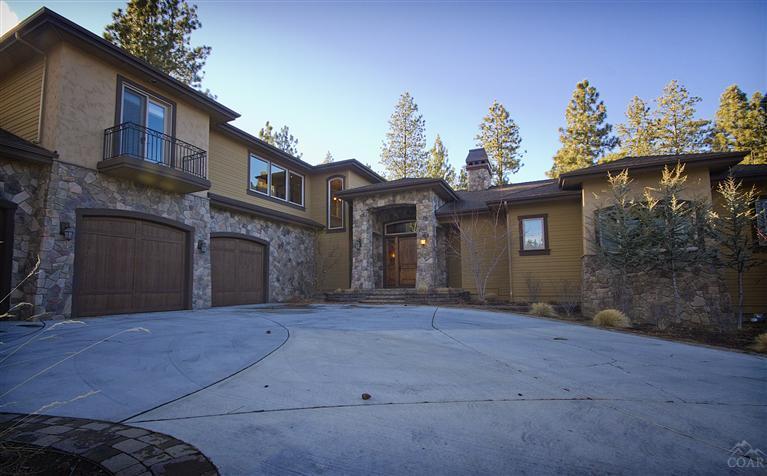 Exquisite, private, quality built home w/Deschutes River views! This hard to find property features over 5300 SF of pure luxury & a fantastic floor plan. Gorgeous hardwoods in main level living area. Master suite on the main features a F/P, wet bar & bath worthy of a Spa. Second Master suite upstairs w/fireplace & deck offering you views of the River. Gourmet Chef's kitchen, winner in the 2008 Tour of Homes, features slab granite counters & the perfect entertainment layout. Much more! A true work of art.