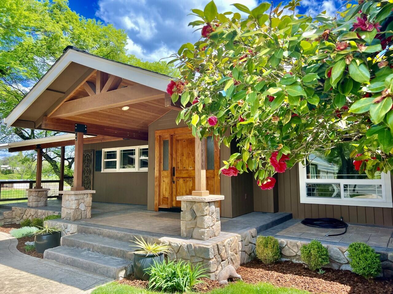 Distinguished by its exquisite location, incredible views and a storybook setting, this one-of-a-kind home will make your heart skip a beat. Situated on a close-to-town drive surrounded by magnificent homes and rolling irrigated pastures, this idyllic property seamlessly blends artful sophistication and unparalleled charm. Lovingly refurbished offering brand new Hickory solid hardwood floors, new interior paint, and newly remodeled baths. The delightful chef's kitchen boasts all the amenities that one would expect and large butler's pantry. Serene primary suite, w/ custom closet cabinetry and spacious bath w/ private terrace. Charming detached guest cottage is fully self-sufficient. The enchanting outdoor space offers mature trees and a sparkling pool and pool house. Turn-key horse property w/ 3 horse stalls w/ runs, tack room, hay storage and a 60'x100' arena. Virgin oil pipe fencing is horse safe. This property is a true masterpiece and features too much to list here!