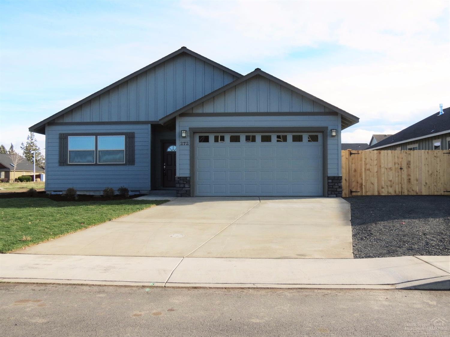 Large Great Room with gas fireplace opens to Dining and Kitchen with eating bar. Knotty Alder cabinets with quartz slab counter tops, all stainless appliances. 30 year roof, forced air gas that is AC Ready. Separate utility room. Double car attached garage. Landscaped front with sprinklers. Single level home with great curb appeal. 167 sq ft deep lot with approx. 15 ft access along the side of the home allow room for that shop or RV Parking.