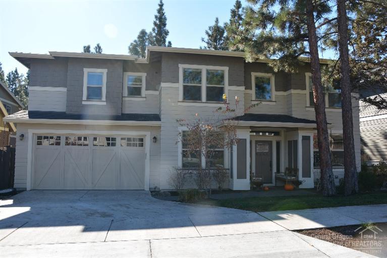 Westside Shevlin Pines - 5 Bedrooms, 3 baths plus den, hardwood floors on main, great room with built-ins, kitchen with raised island/bar, stainless appliances includes refrigerator, gas cook-top, covered patio. Master Suite, 2 walk-in closets, tile surround bath with walk-in shower, soaking tub, double vanity. Bonus room up-stairs. 3-car garage with 3 walls of built-ins. Aprilaire Humidifier, AC, central vac, fenced yard, sprinkler system, level driveway. Walking distance to Shevlin Park trail system.