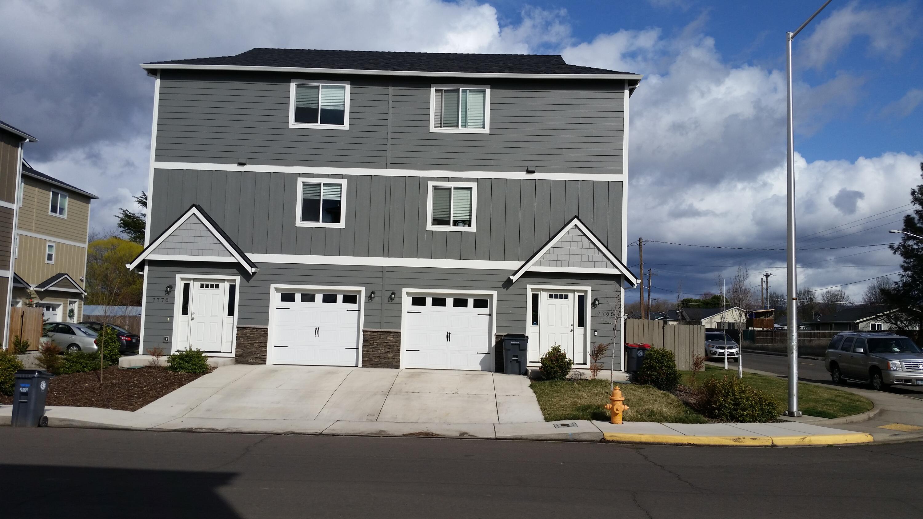 Nicely maintained townhome! This 2019 built, one owner home has approx. 1,344 square feet with a  2 bedrooms, 2 1/2 bath floor plan. Open kitchen with granite counter tops, breakfast bar, stainless appliances and (washer/dryer and refrigerator) included. Featuring the main Living Area on 2nd floor, Master Bedroom and bath on 3rd floor. Guest bedroom and full bath located on ground level. Ductless Heat pump. Homes are Energy Trust certified for optimum efficiency. Finished garage. Nice views of the surrounding mountains and MT. McLoughlin.