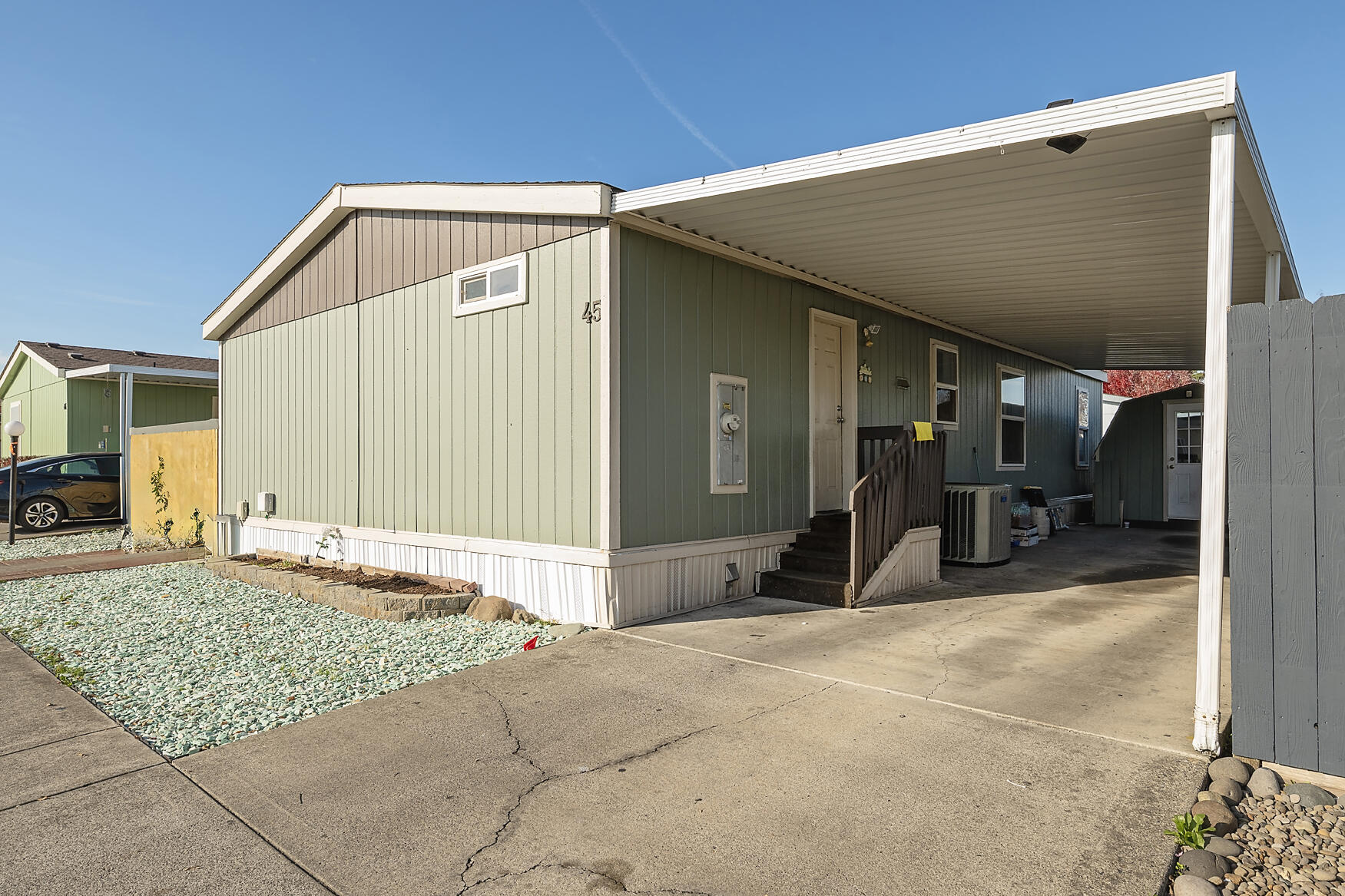 ✨ Fresh Exterior Paint - Move-In Ready!
This home offers 3 spacious bedrooms, each with its own walk-in closet, perfect for comfortable living and extra storage. Enjoy the beauty of brand-new laminate flooring throughout and a conditioned shed—ideal for a workspace, storage, or hobby room.

Located in a well-maintained all-ages park with a space rent of $925 per month!