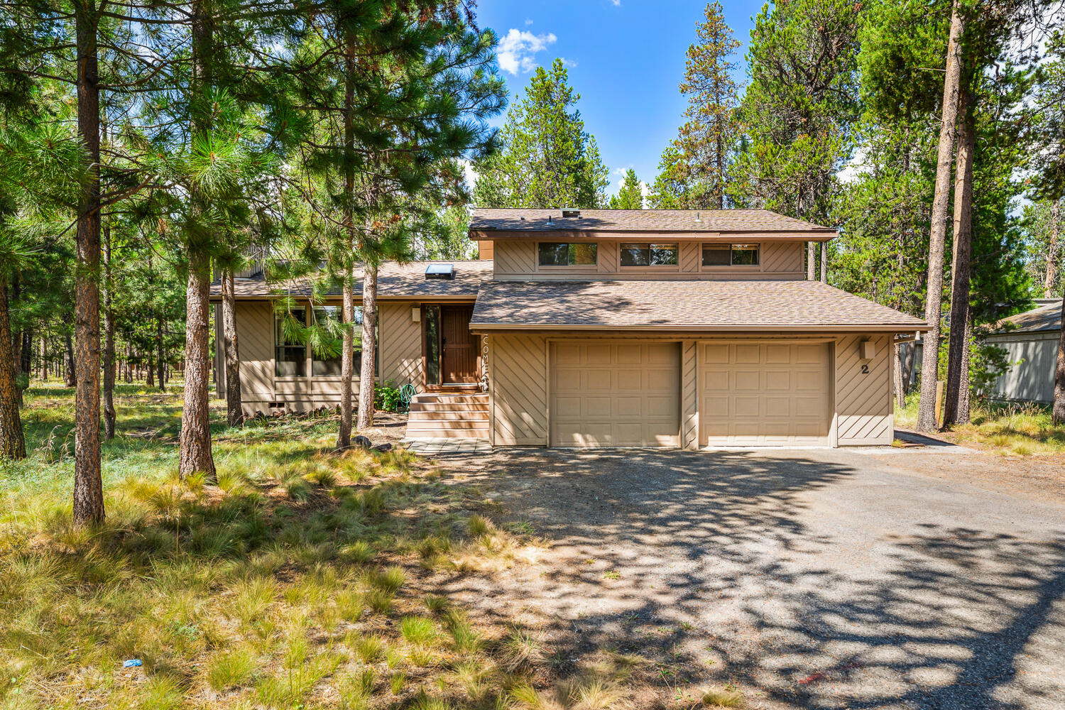 Welcome to your Sunriver retreat! Set on a spacious, tree-filled lot that borders common space and the bike path, this home offers both privacy and convenience to nearby amenities. Bright windows bring the outdoors in, while a wood-burning fireplace creates the perfect gathering spot. With over 1,850 sq. ft., this home features 4 bedrooms, 2.5 baths, and a 2-car garageâ€”plenty of space for everyone to spread out, connect, and make memories year-round. A bonus room with patio access and powder bath is ideal for game nights. Enjoy the tiered deck and private hot tub after a day of play. Comes turn-key.