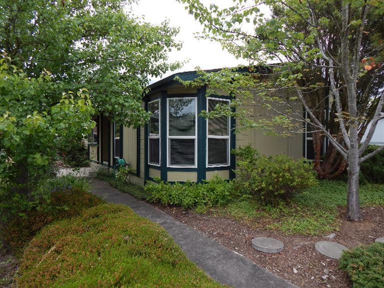 Well maintained, single owner home in an all age park. There are 3 bedrooms (one of which is currently used as an office and does not have a closet), and 2 full baths. New heat pump in 2014. Large, light filled living and dining rooms with vaulted ceilings, spacious kitchen with skylight and walk-in pantry and a master bedroom with double closets. Master bath includes large soaking tub, separate shower and double sinks. Conveniently located close to the YMCA, shopping and public transportation.