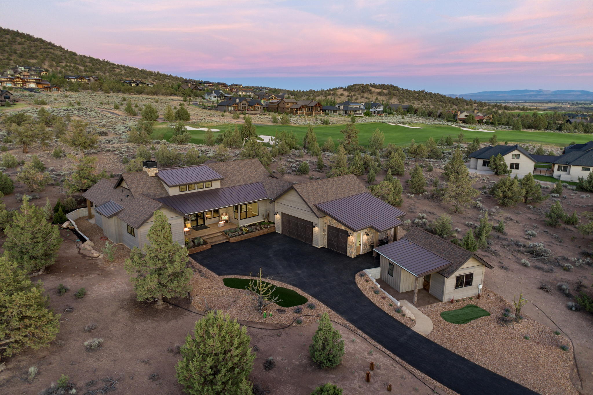 The Cascade mountains are calling! Thoughtfully positioned at the end of a quiet cul de sac, as a buyer you will experience a one owner custom masterpiece. Natural elevation lets you gaze out over the treetops and enjoy the expansive Cascade Mountain views from the front, and lush golf course views from the back. Scenic views and natural light are captured in every picture window or from your 4 spacious covered patios. Featuring a great room style single level layout that maximizes its square footage and highlights primary bedroom separation, a chef's kitchen, 10 ft. tall ceilings, car charger & dog spa! The oversized 3-car garage offers an excess of storage and has room for all your recreational toys. Custom built light fixtures, barn wood accents and showcase tile work/striking quartz counters are showcased throughout the home. A standalone casita is a perfect office/hobby space or guest quarters. Enjoy luxury, seclusion, and the ranch lifestyle in this builder/owner custom home!