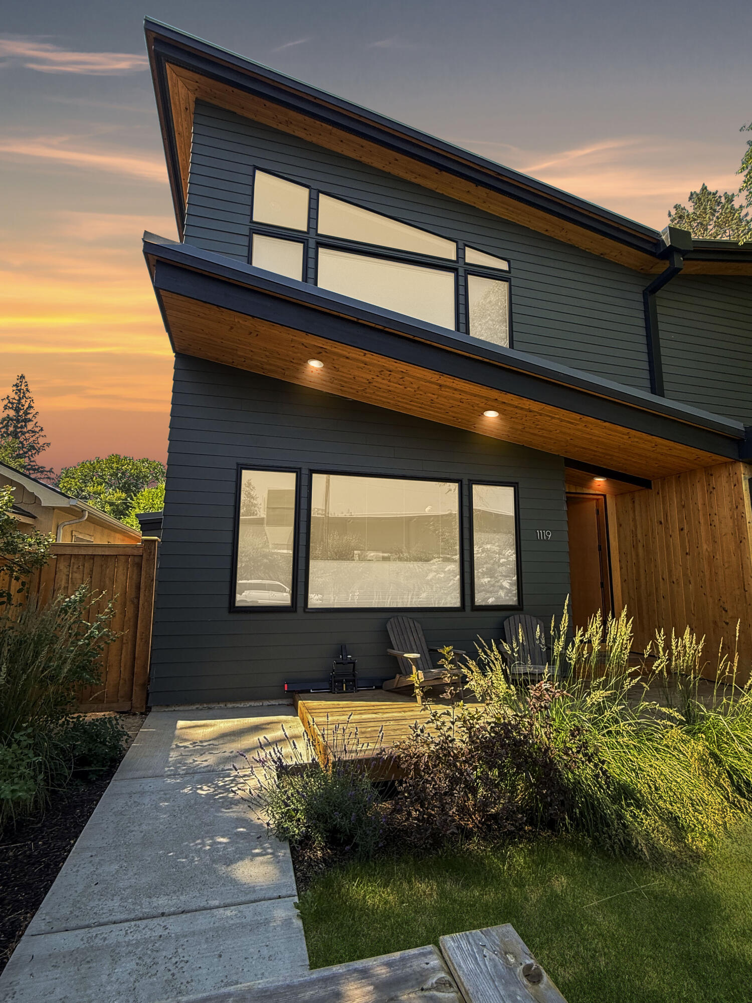 Stunning newer-built townhome nestled just minutes from downtown Bend, offering the perfect blend of modern comfort and urban convenience. Thoughtfully designed with high-quality finishes throughout, this home features custom cabinetry crafted by a local artisan, adding a touch of uniqueness and craftsmanship. The open floor plan is ideal for entertaining, with a spacious living area that flows into a stylish gourmet kitchen and dining area. Lavish primary suite with spa-like bath. Enjoy your mornings with coffee from nearby cafes (Backporch) or stroll to the vibrant Newport Market for fresh groceries. Savor delicious sushi at Kanpai, or unwind on the upper back deck  after a day exploring Bend's outdoor wonders. With walkability to downtown Bend and Drake Park, this location puts the best of Bend at your doorstep.