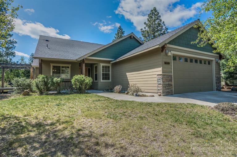 Spacious single-level home located in desirable Mountain Pines neighborhood. Featuring tile entry, vaulted great room with stone fireplace & beautiful bamboo floors throughout great room, dining area & kitchen. Hickory cabinets, stainless appliances & oversize laundry room with custom built-ins & sink. Large deck with pergola located off great room perfect for entertaining & private patio off master bedroom. Landscaped yard and sprinkler system. Conveniently located to many amenities & outdoor activities.
