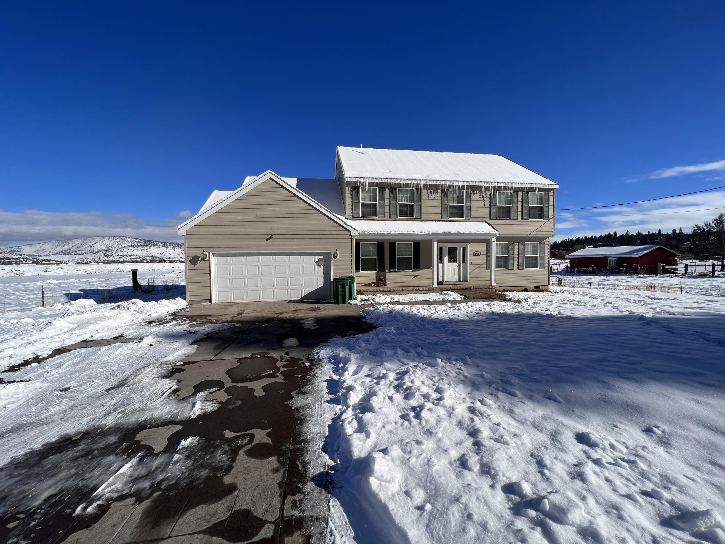 New and Improved Price .Beautiful Views on this 4 bedroom 2 .5  bath with home office. Located in the well sought after Lake Shore Garden area of Klamath Falls . No Hoa's or CC&Rs Watch spectacular sunrise and sunsets as well as the the Firecracker Regatta and sailboat races from the privacy of your own home . Close to OIT, Hospitals and Public Docks. Perfect for strolls down local trails .
