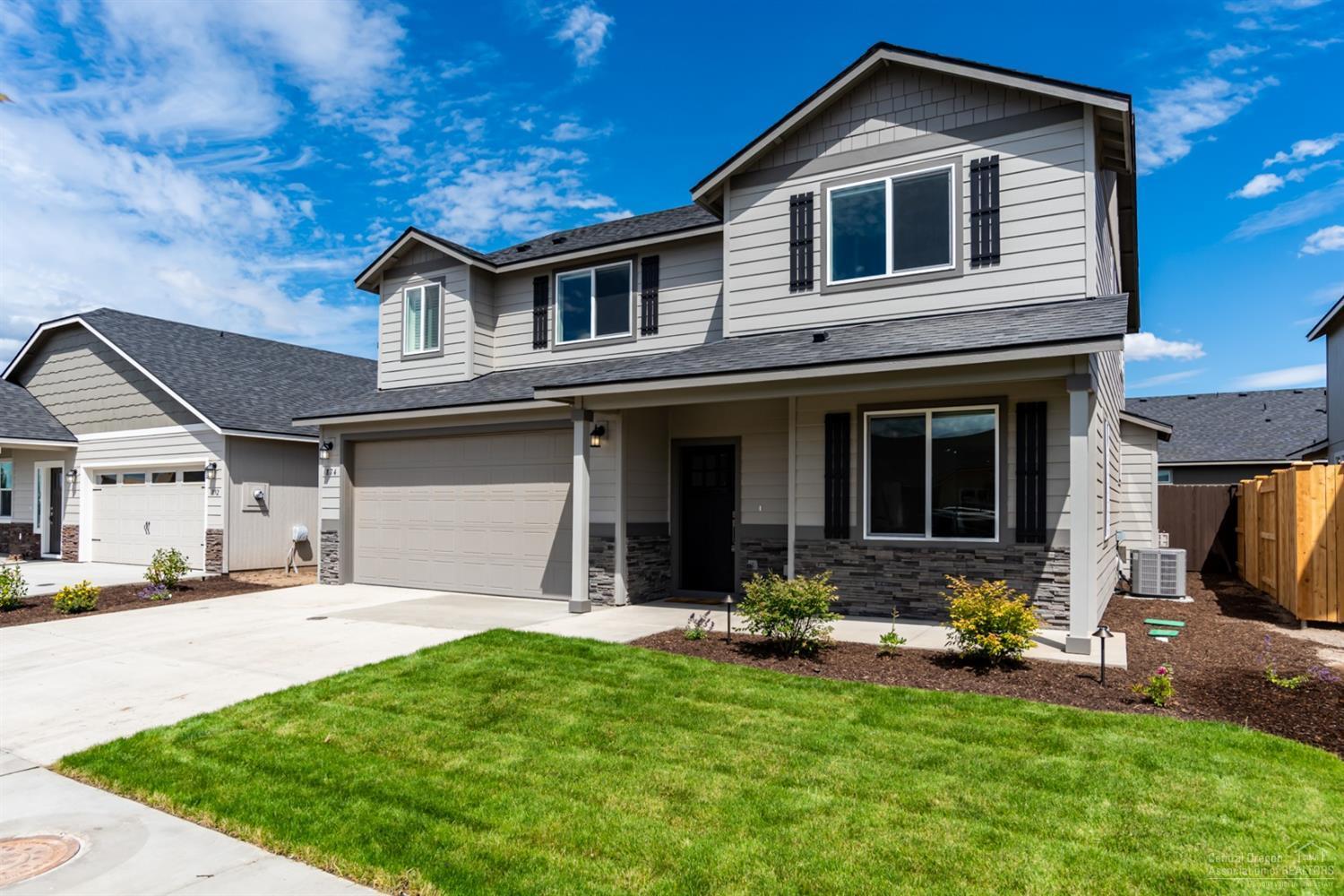 This year's COBA Showcase home is a 2192 square foot model in Redmond's Maple Meadows neighborhood built by custom home-builder Lifestyle Homes and boasts a 4-bedroom functional floor plan with an open concept and a main level den/office. The home gives you everything you need in an impressive design all while meeting Earth Advantage Gold certifications. Gas fireplace, A/C, tank-less water heater, solid surface quartz slab counter tops with under mount sinks stand out in the kitchen and bathroom as well as high quality LVP flooring to reduce noise and increase durability. Full window covering package, upgraded pantry and master closet package, double wall construction on all 4 sides, blown in insulation, insulated garage, wired for audio, video and security, and fully fenced and landscaped.