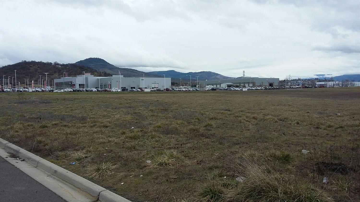 SOLD ONLY   
Ready for development, approx. 6.22 acre lot just east of Lithia BMW/ Chrysler/ Jeep/ Dodge, Nissan and Volkswagen in North Medford. The property is zoned Light Industrial.